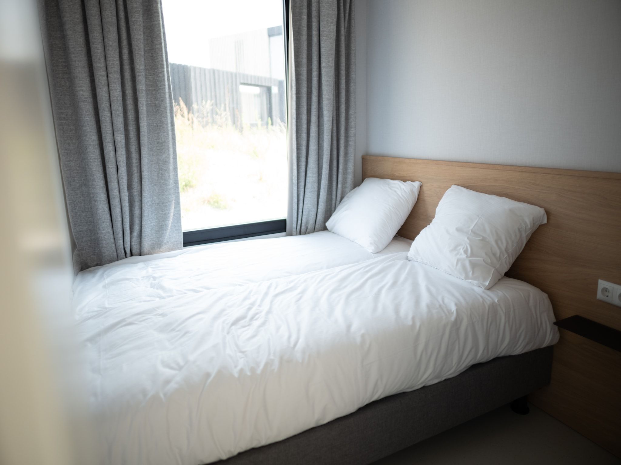 Een slaapkamer van Sea Lodges Zandvoort 1 in Zandvoort