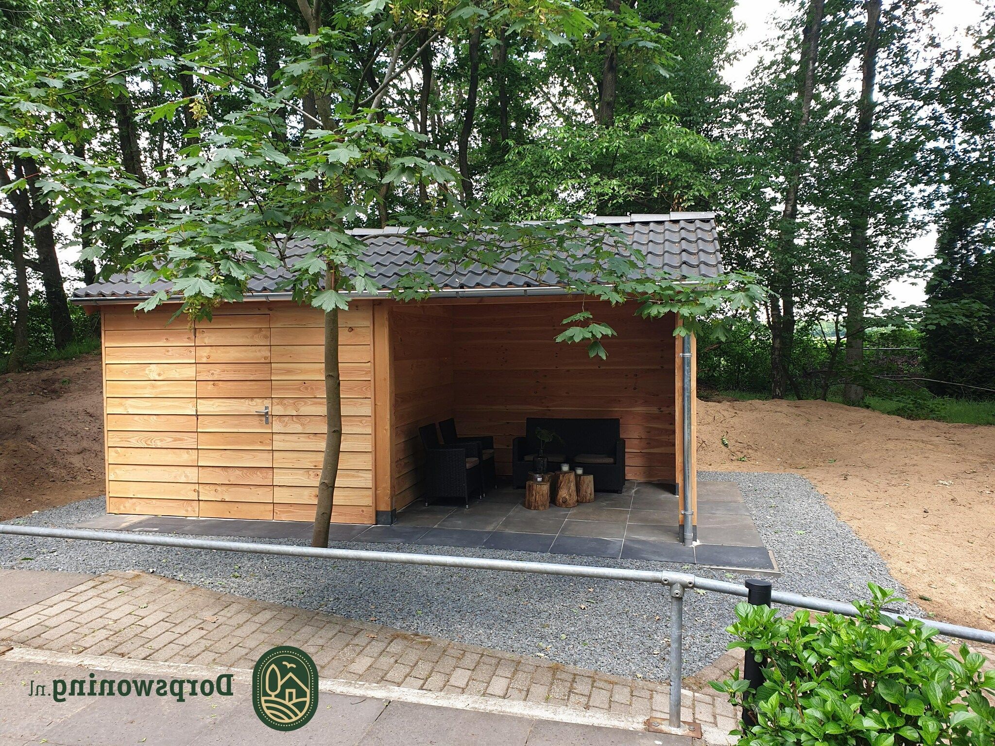 De buitenkant van Dorpswoning In het Bos in Leende