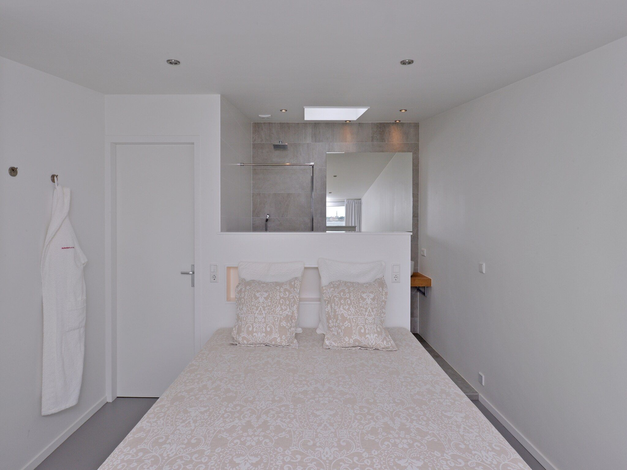 Een slaapkamer van Havenweg 12 in Kamperland