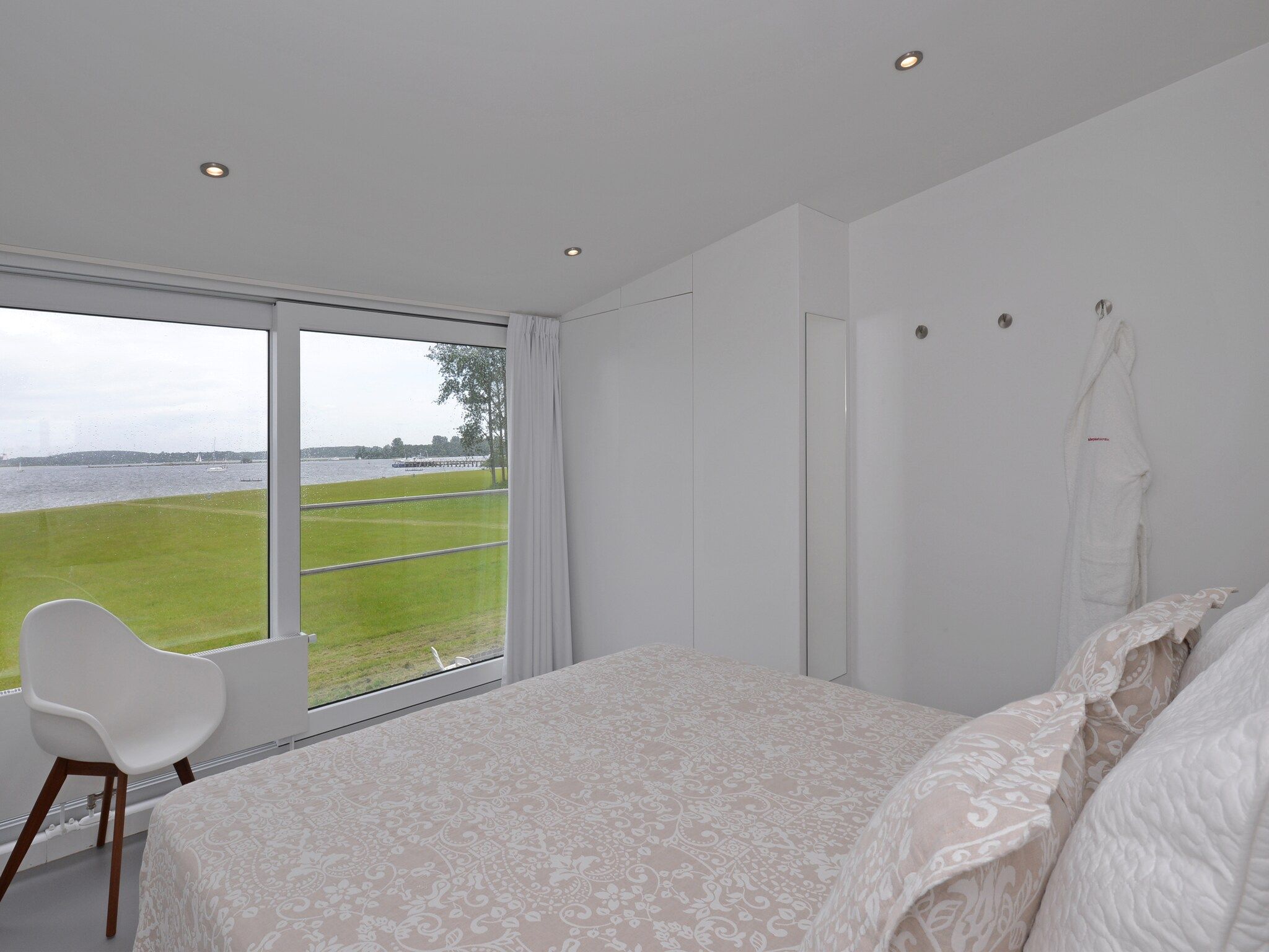 Een slaapkamer van Havenweg 12 in Kamperland