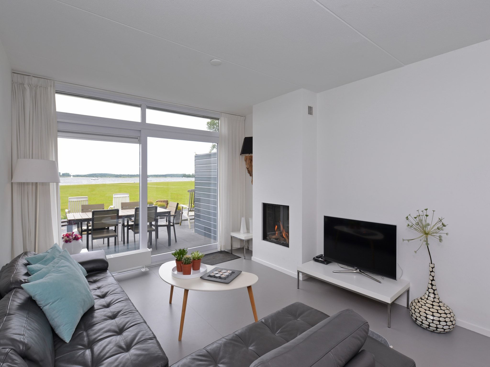 De woonkamer van Havenweg 12 in Kamperland