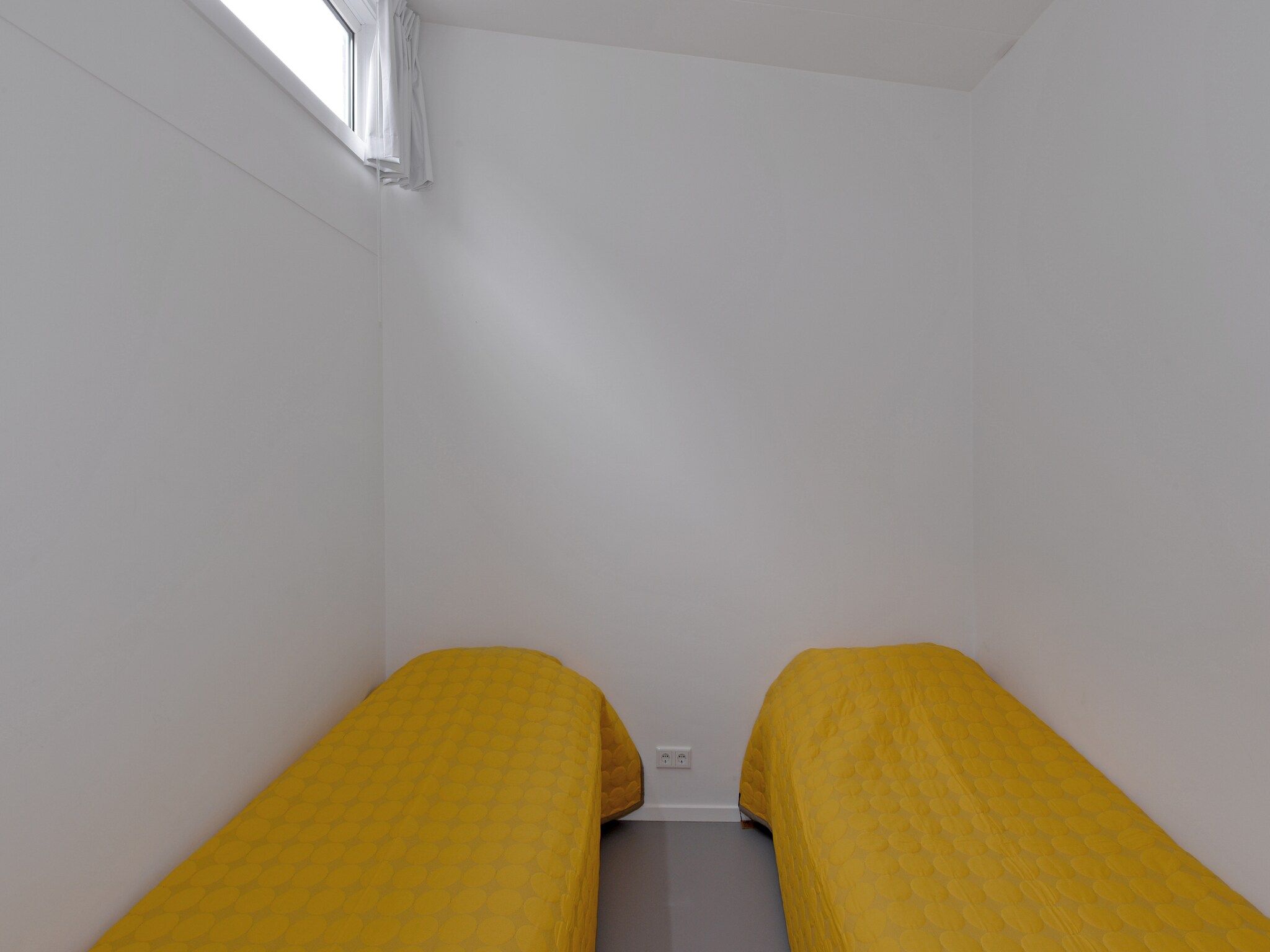 Een slaapkamer van Havenweg 12 in Kamperland