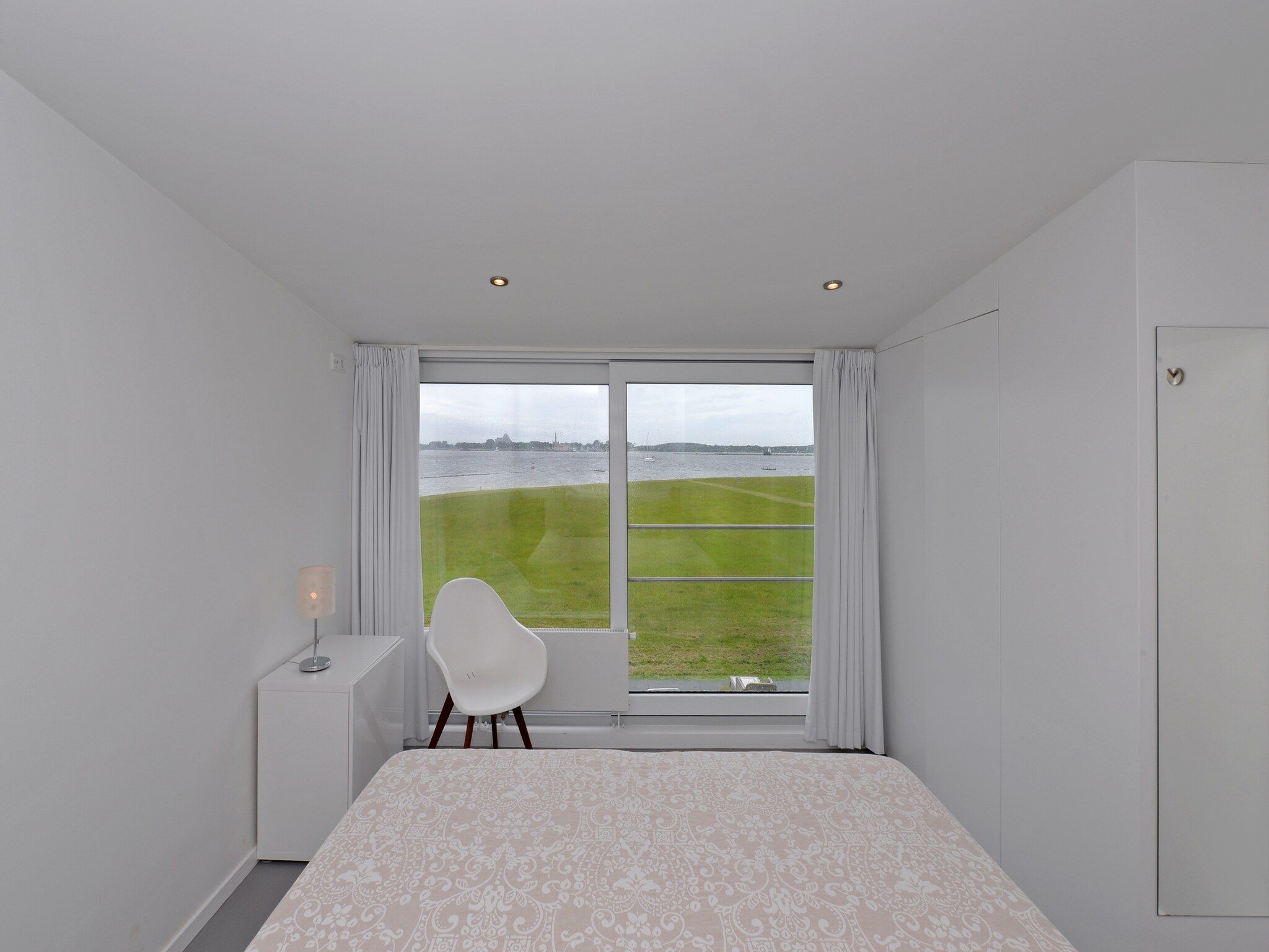 Een slaapkamer van Havenweg 12 in Kamperland