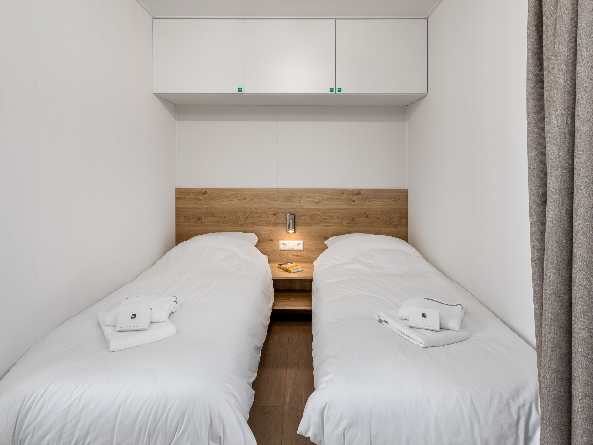 Een slaapkamer van Water Village 1 in Kamperland