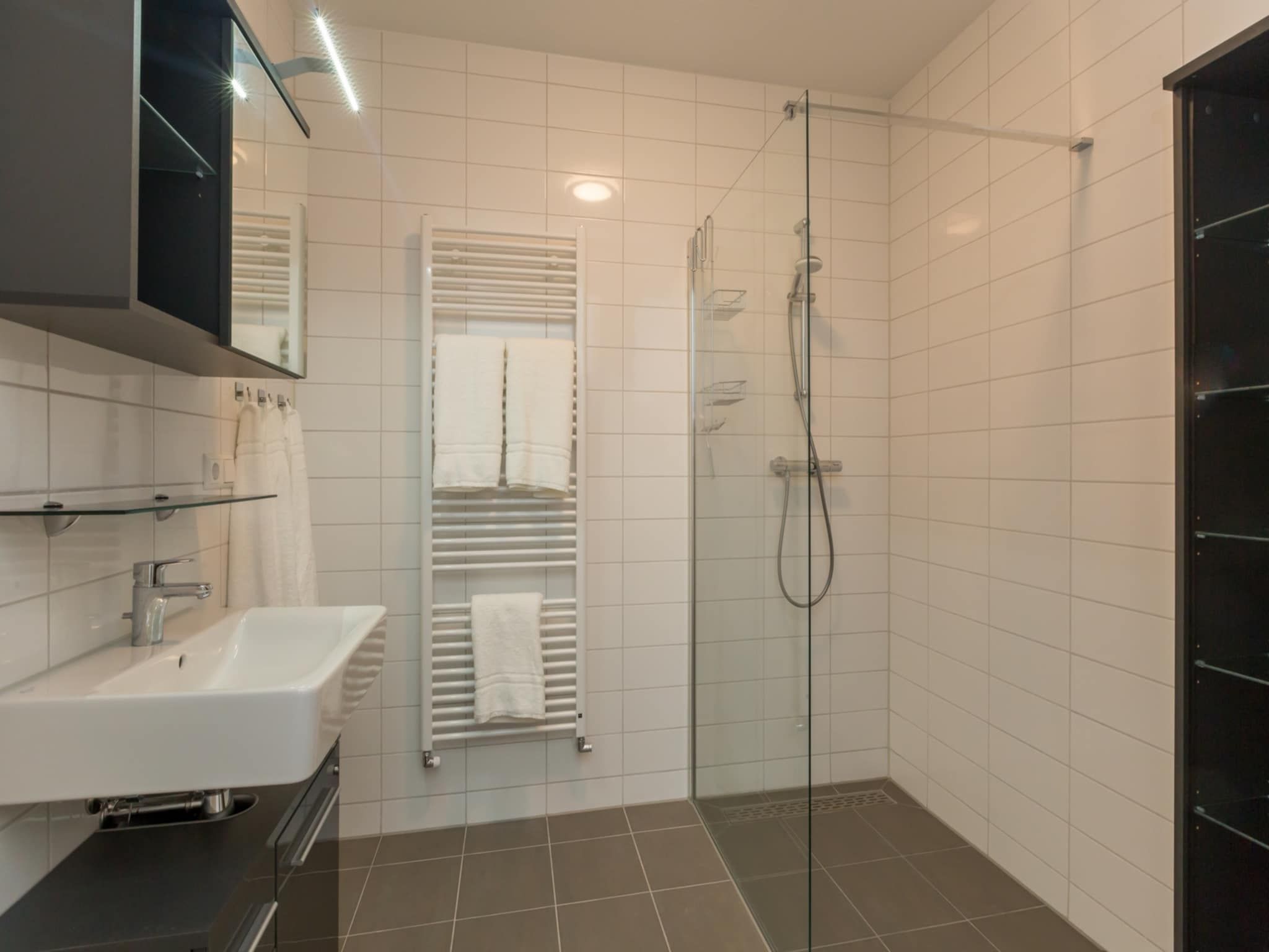 De badkamer van Aparthotel Zoutelande - 5 pers luxe appartement in Zoutelande