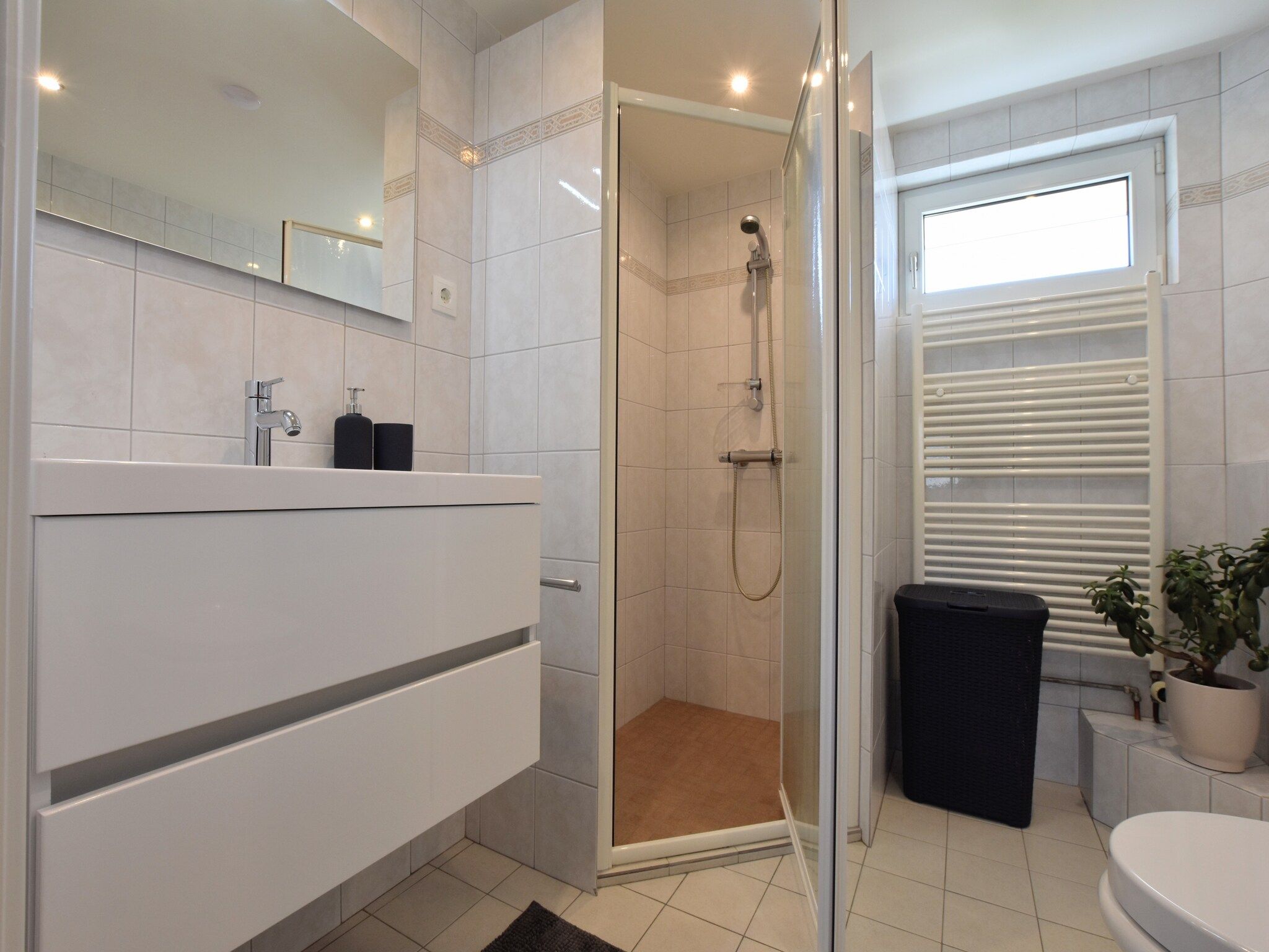 De badkamer van Villa Grenszicht in Megchelen