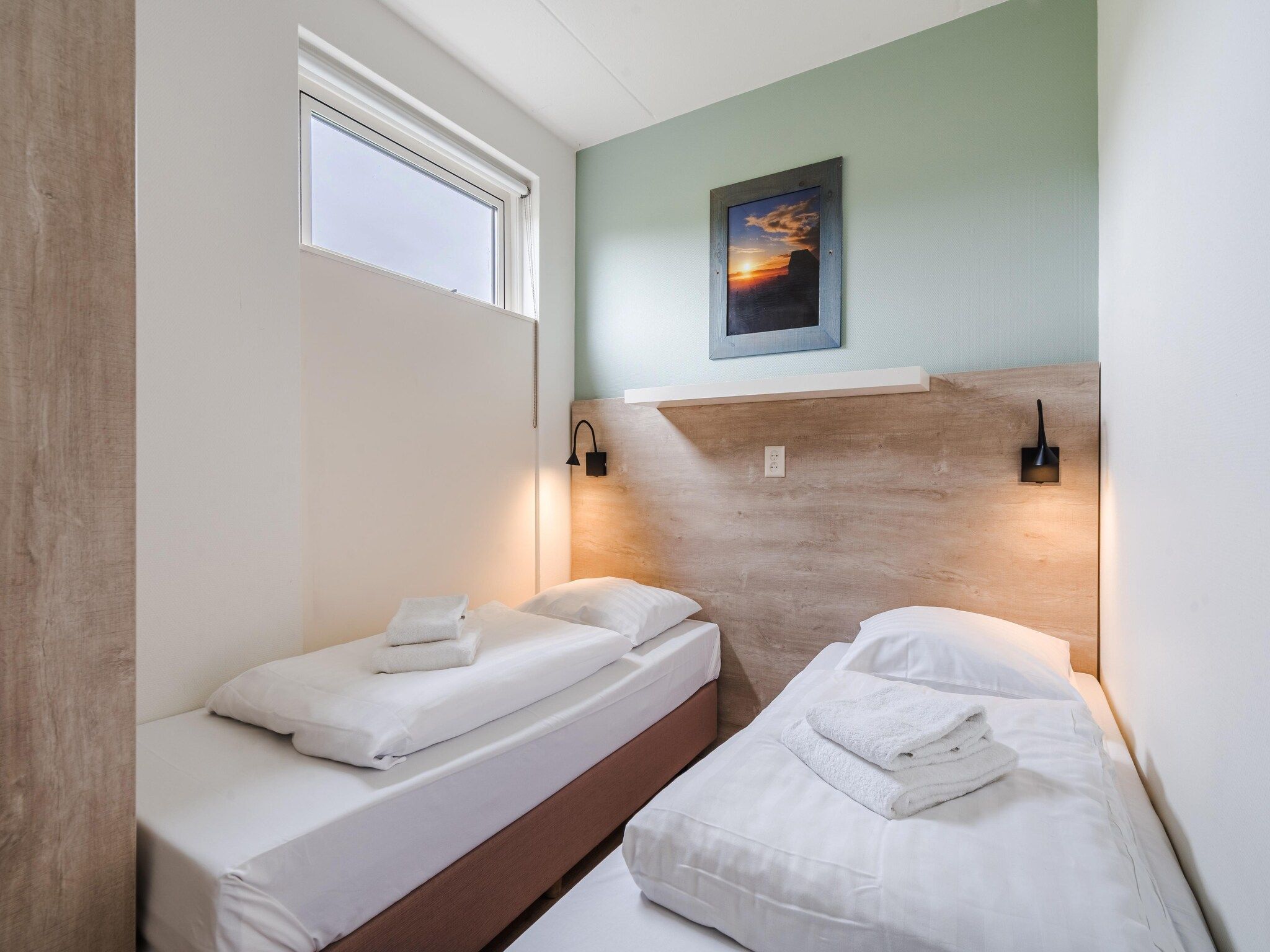 Een slaapkamer van Bosch en Zee 3 in De Koog Texel