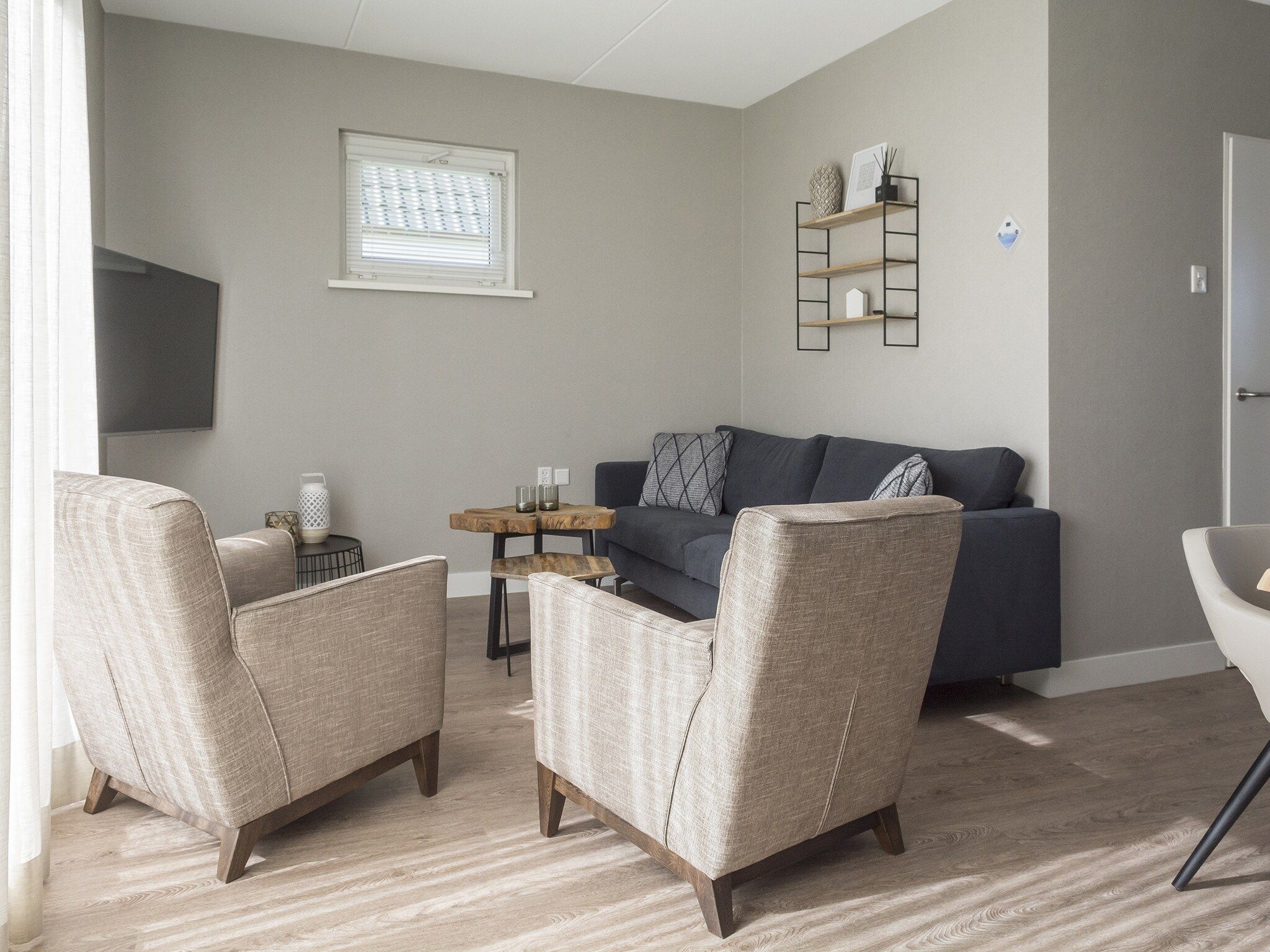 De woonkamer van Bouwlust E11 in De Cocksdorp Texel