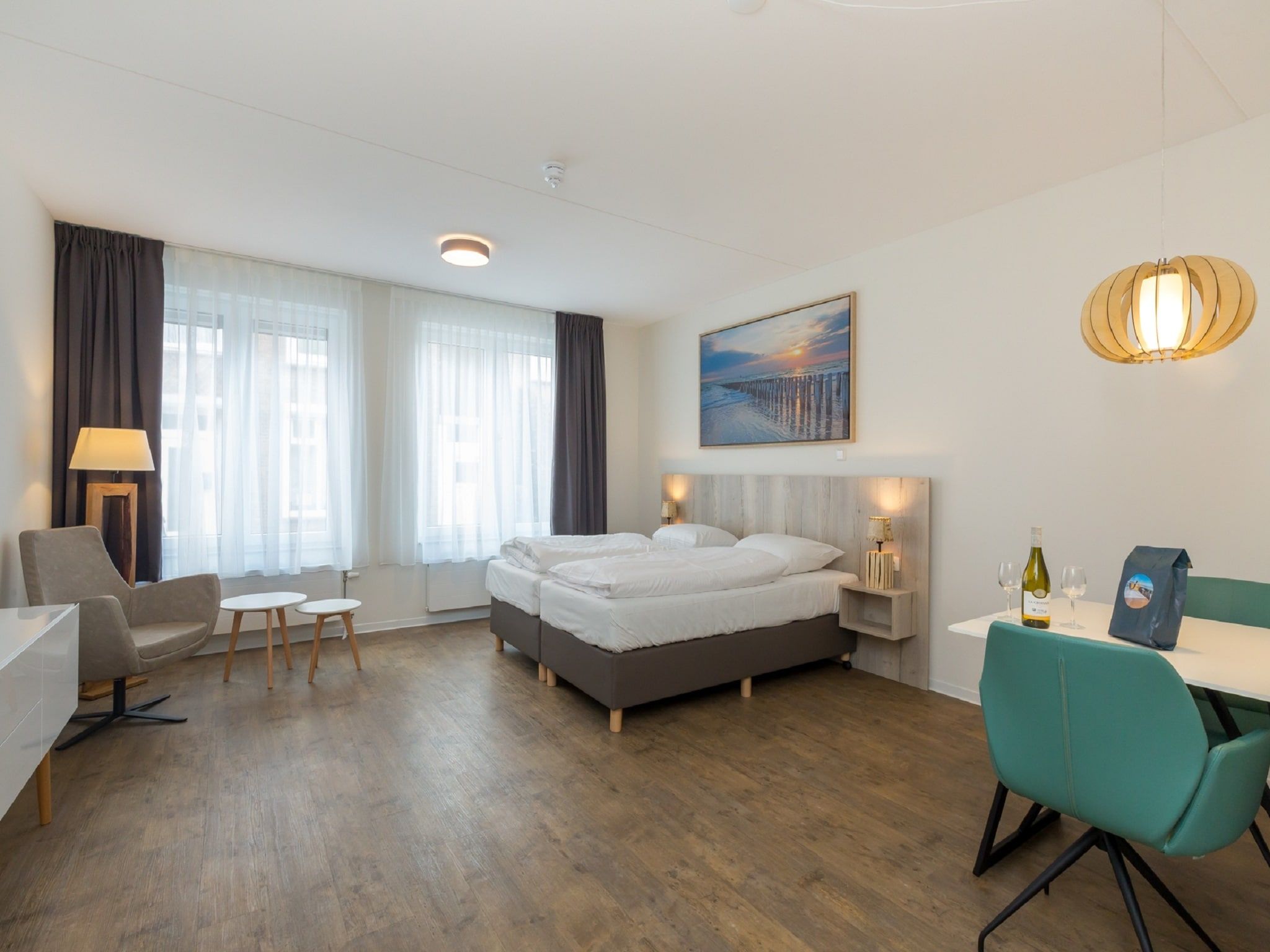 Een slaapkamer van Aparthotel Zoutelande - 2 pers luxe studio - huisdier in Zoutelande
