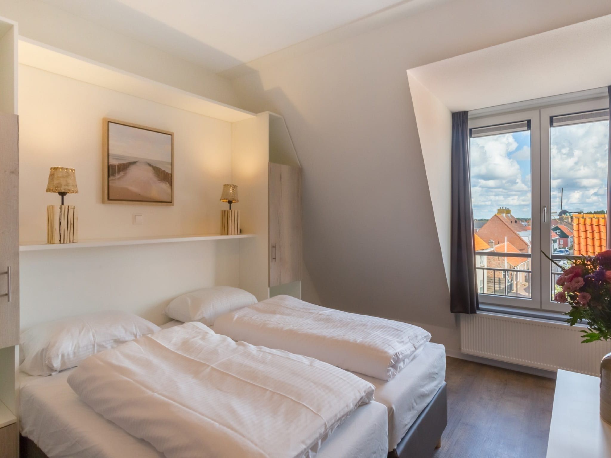 Een slaapkamer van Aparthotel Zoutelande - 2 pers luxe studio - huisdier in Zoutelande