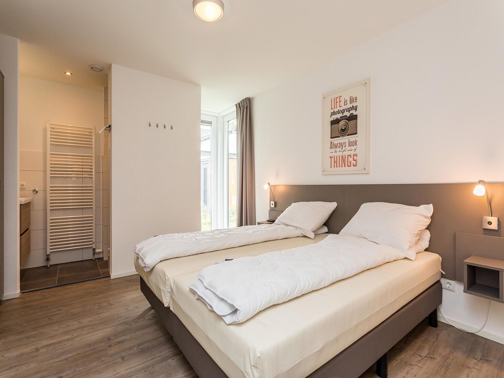 Een slaapkamer van Buitenhof De Leistert 23 in Roggel