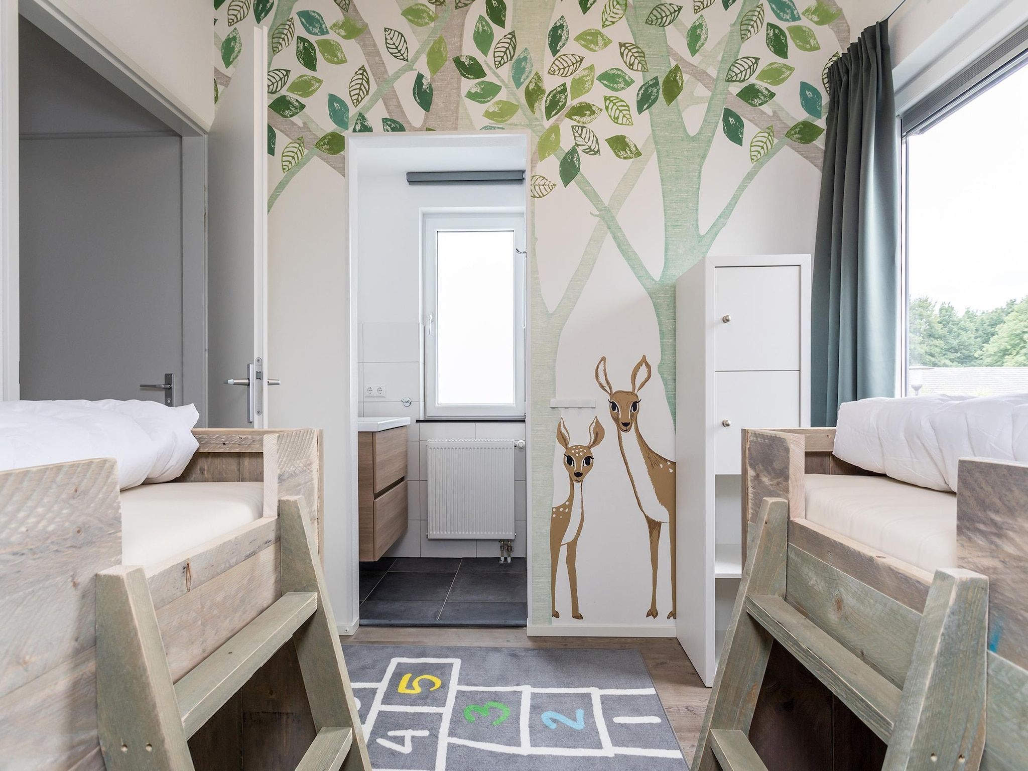 Een slaapkamer van Buitenhof De Leistert 24 in Roggel