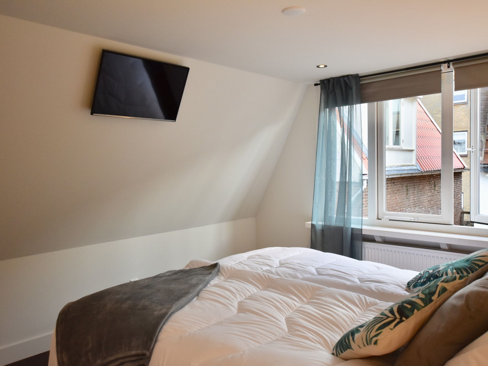 Een slaapkamer van HuizeDuin in Egmond aan Zee