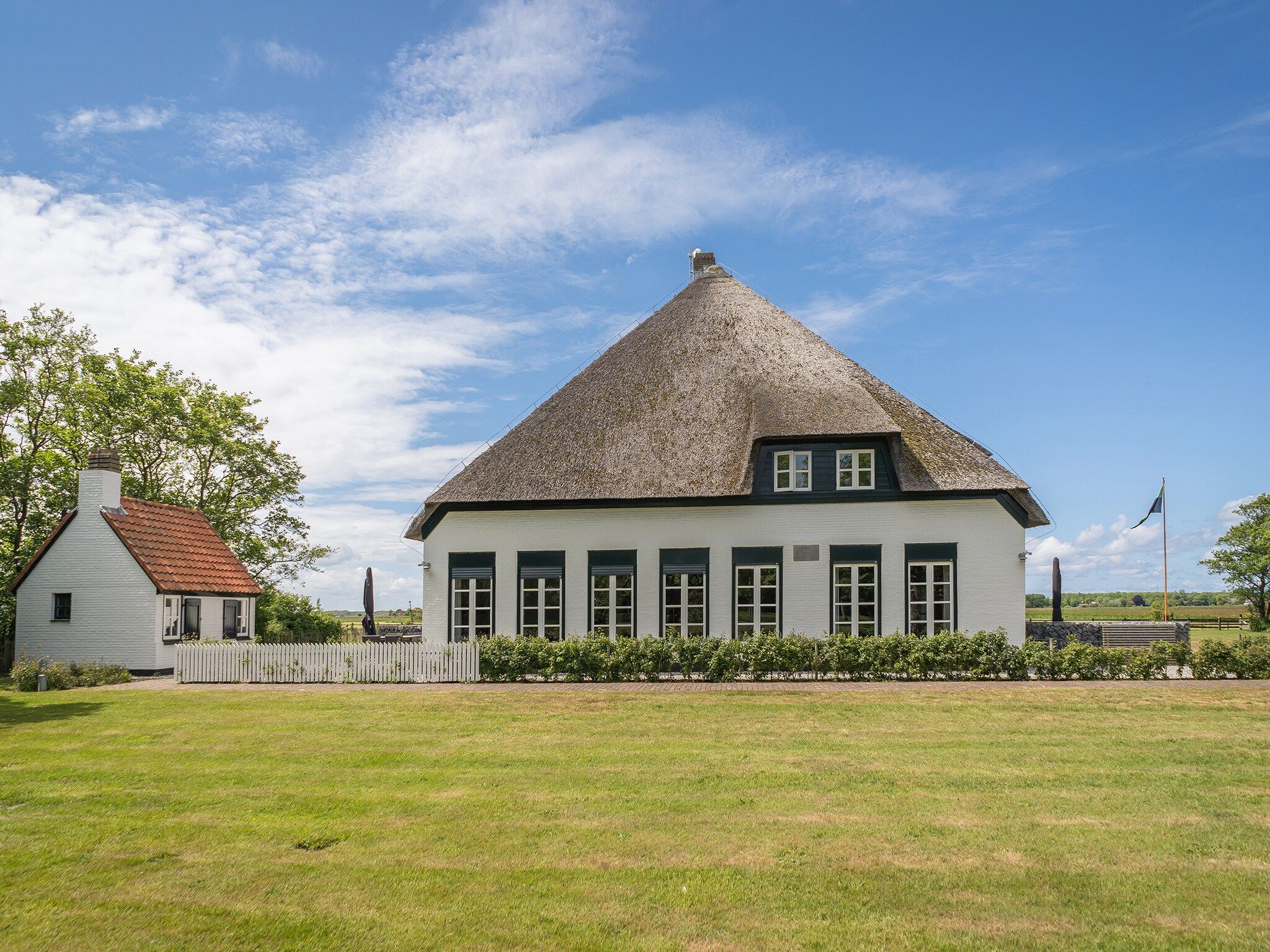 De buitenkant van Appartement Hoeve Holland R1 in De Cocksdorp - Texel