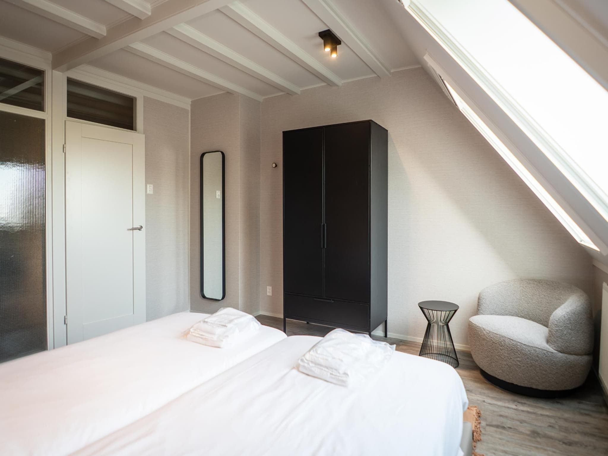 Een slaapkamer van Appartement Hoeve Holland X7 in De Cocksdorp Texel