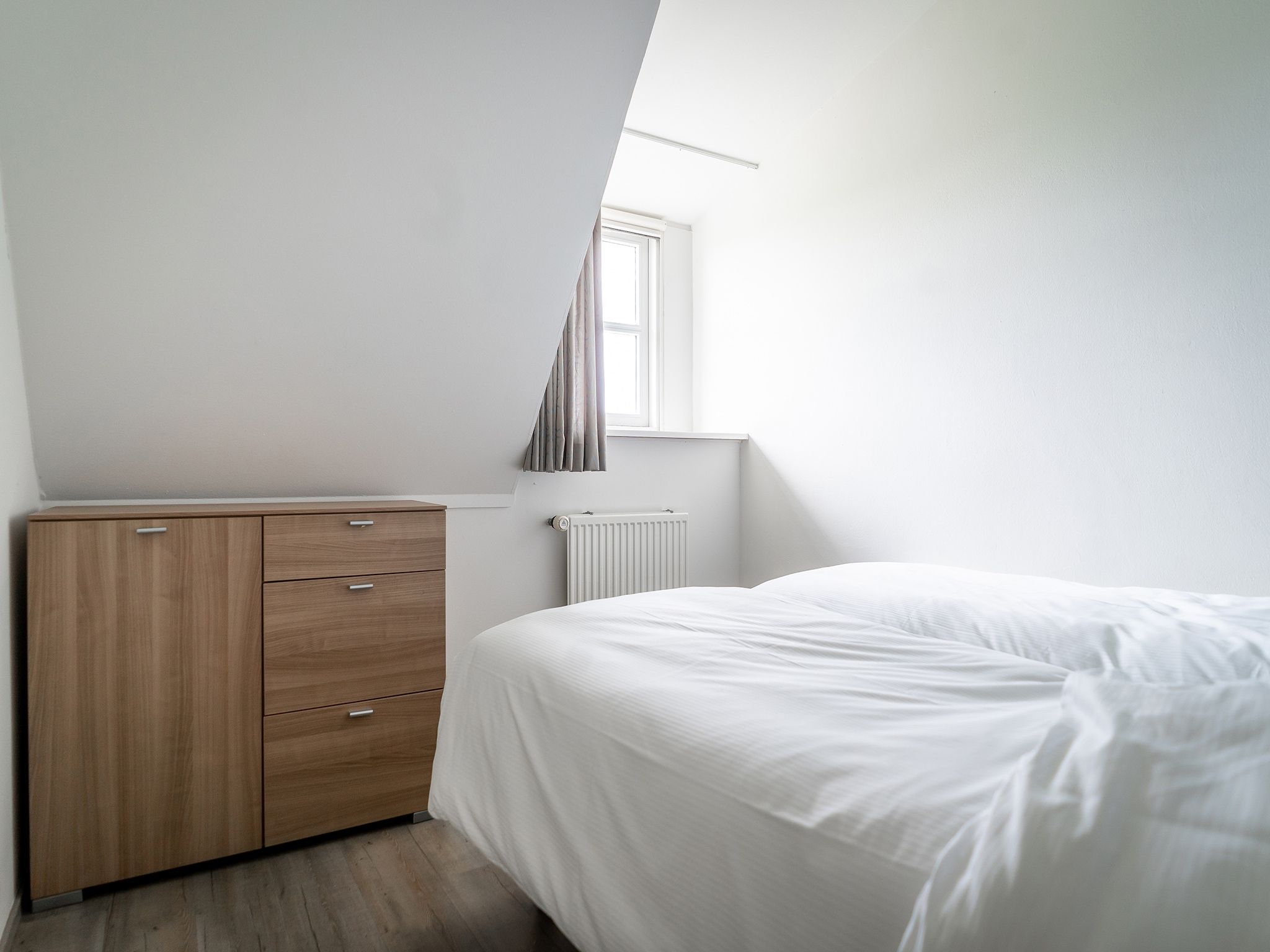Een slaapkamer van App Hoeve Holland T4 in De Cocksdorp Texel