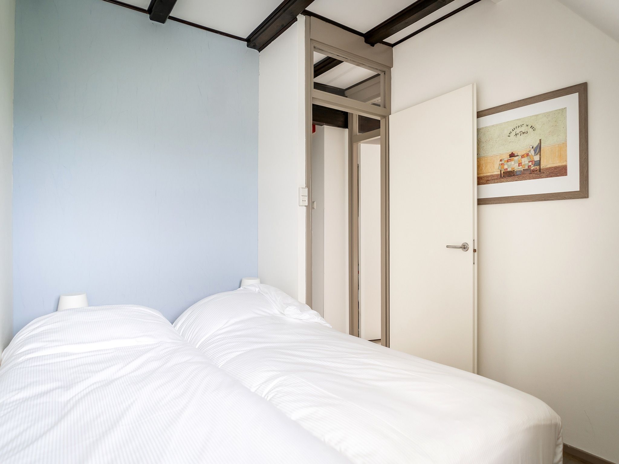 Een slaapkamer van App Hoeve Holland T4 in De Cocksdorp Texel