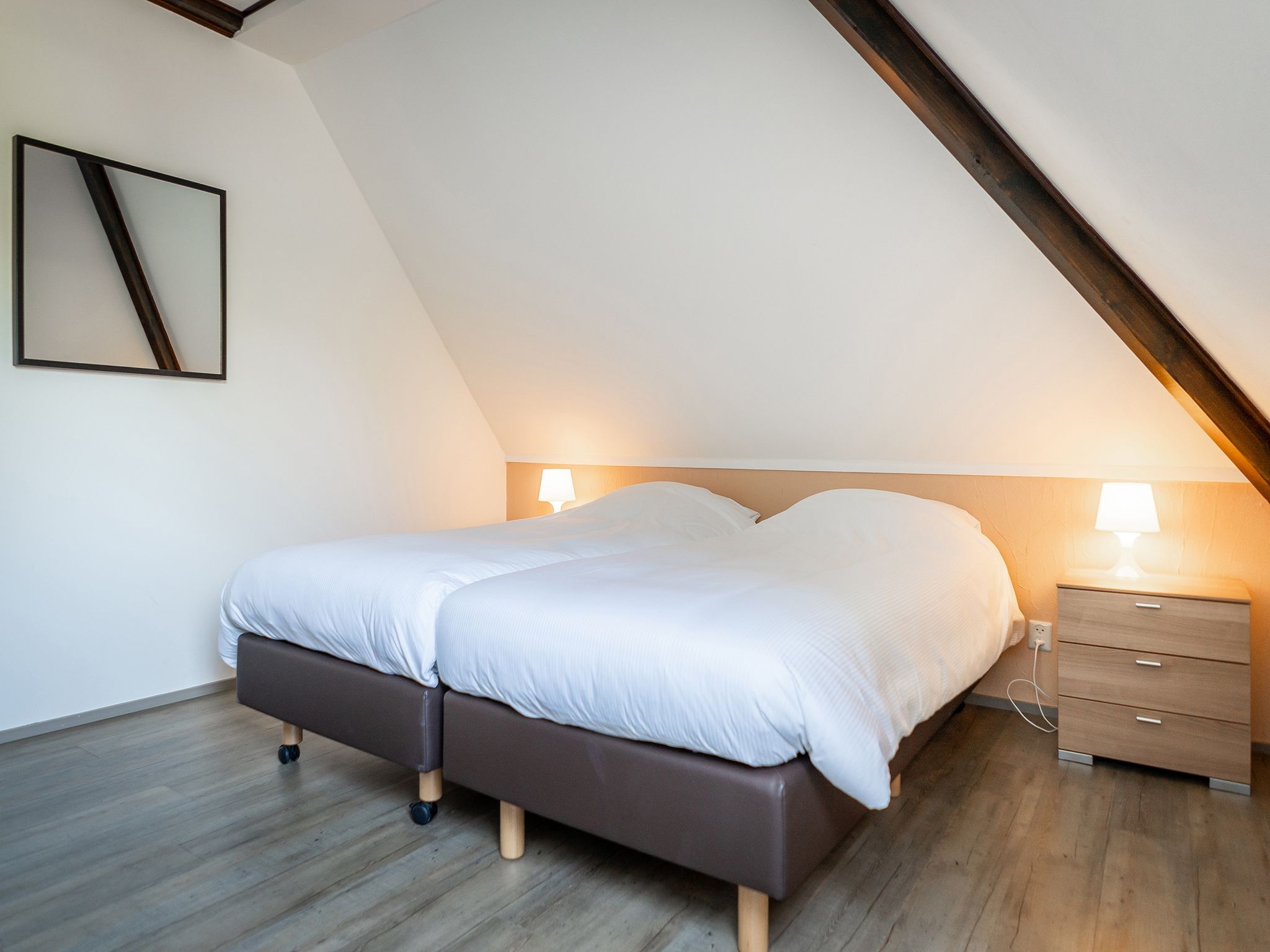 Een slaapkamer van App Hoeve Holland T3 in De Cocksdorp Texel