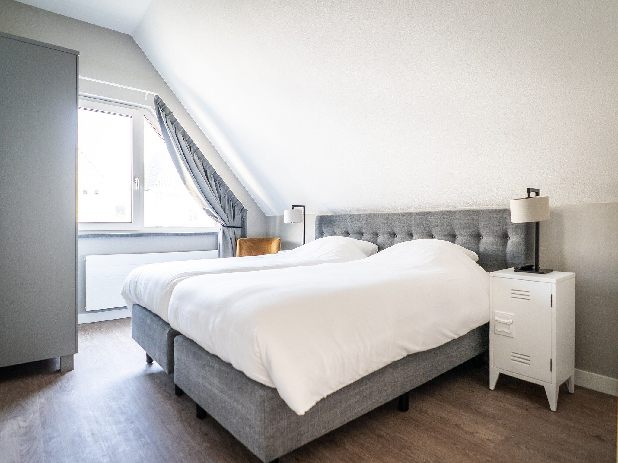 Een slaapkamer van Hodshonstraat B-12 in De Cocksdorp