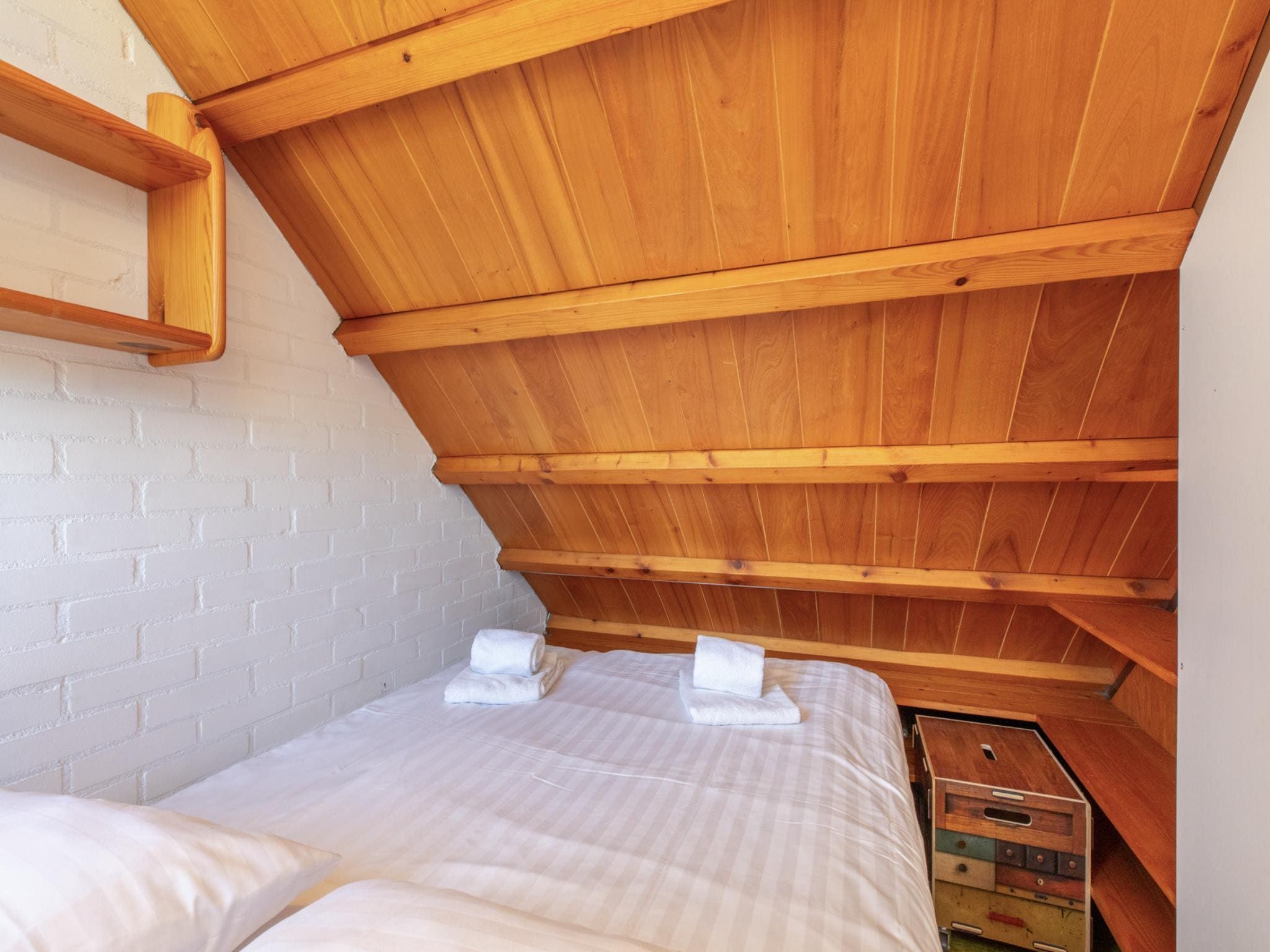 Een slaapkamer van De Haaijmanweg 5 in Burgh-Haamstede