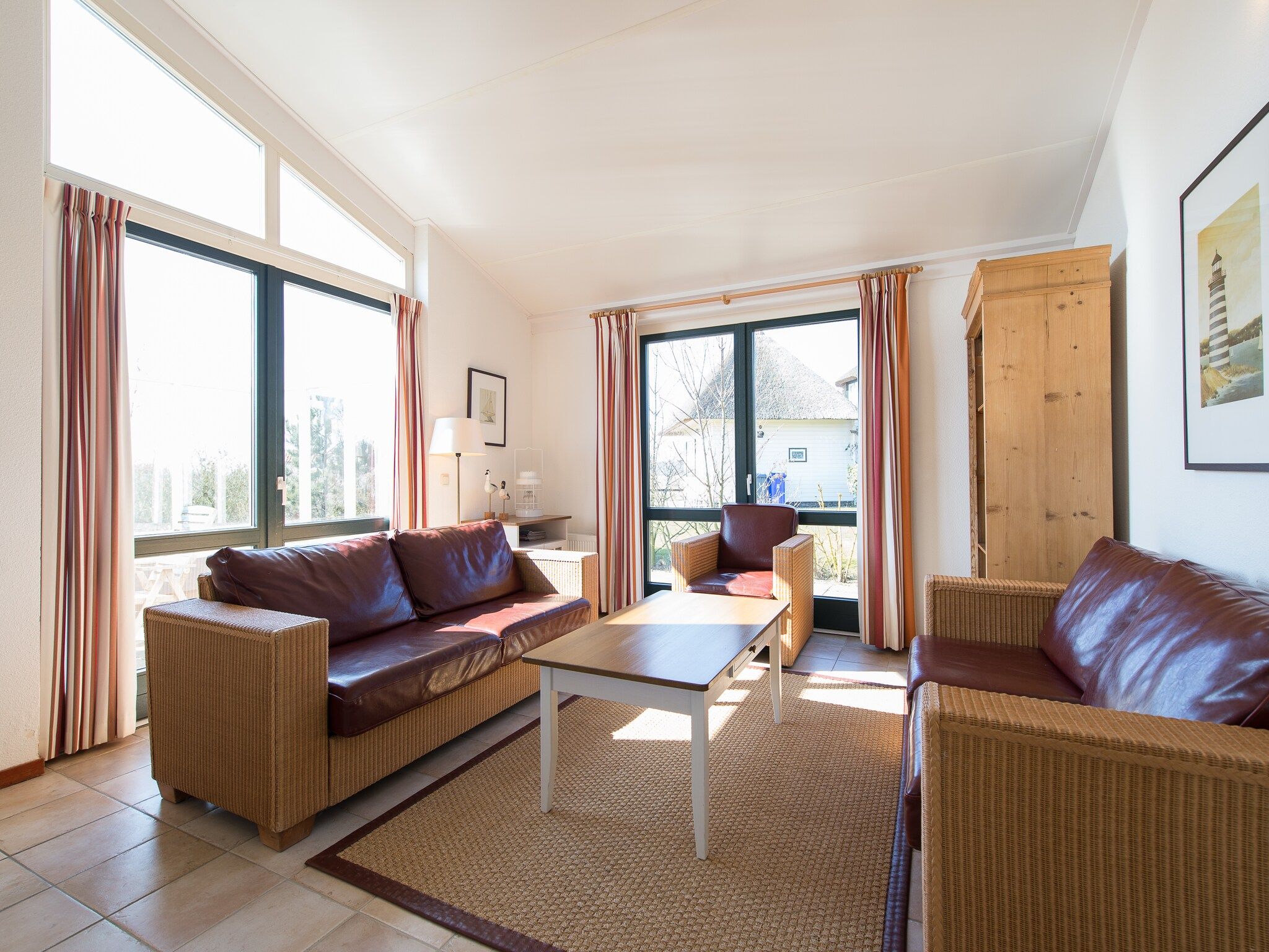 De woonkamer van Vakantiepark Boomhiemke 13 in Hollum