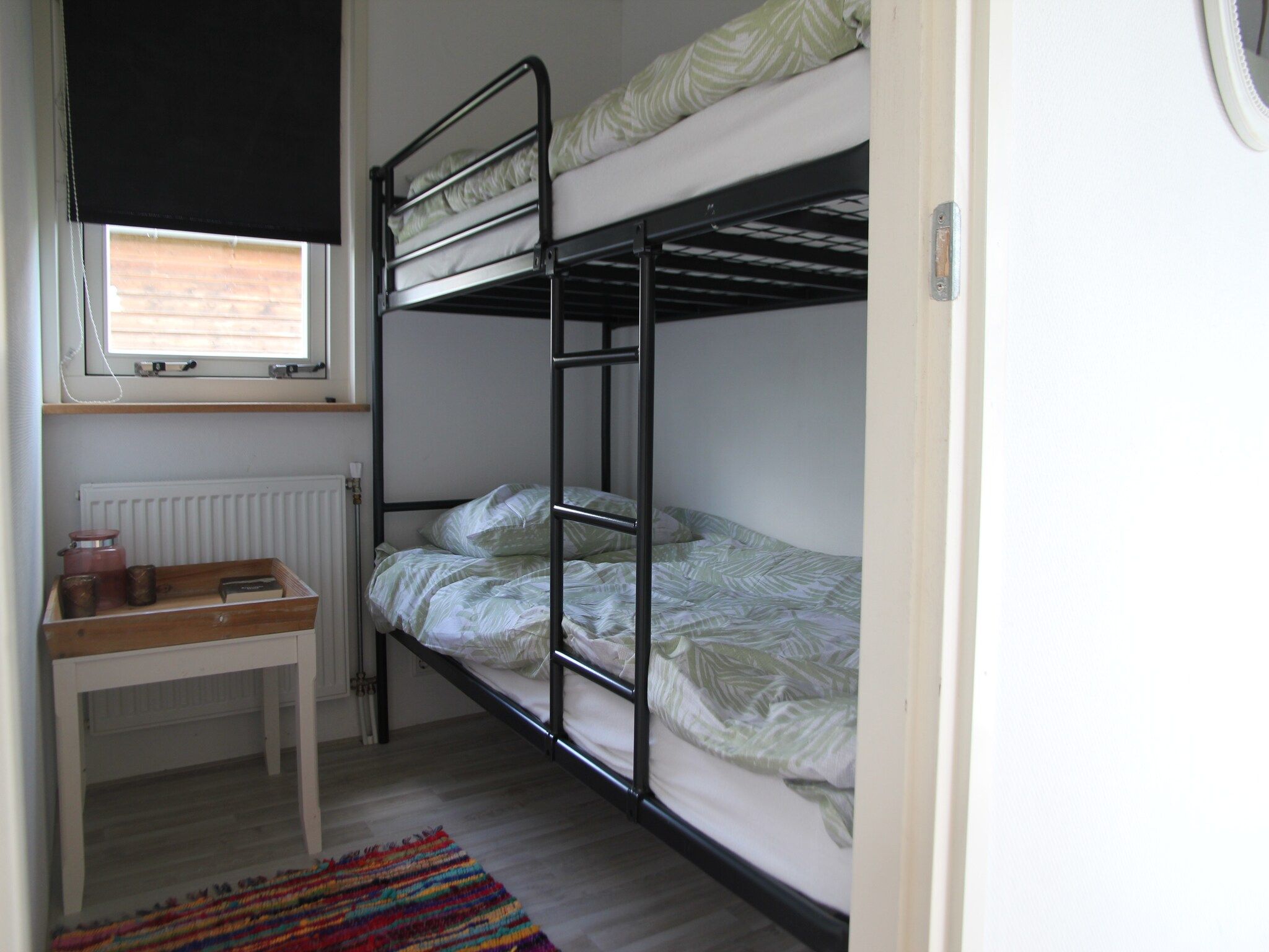 Een slaapkamer van Landelijk bij Zee in Warmenhuizen