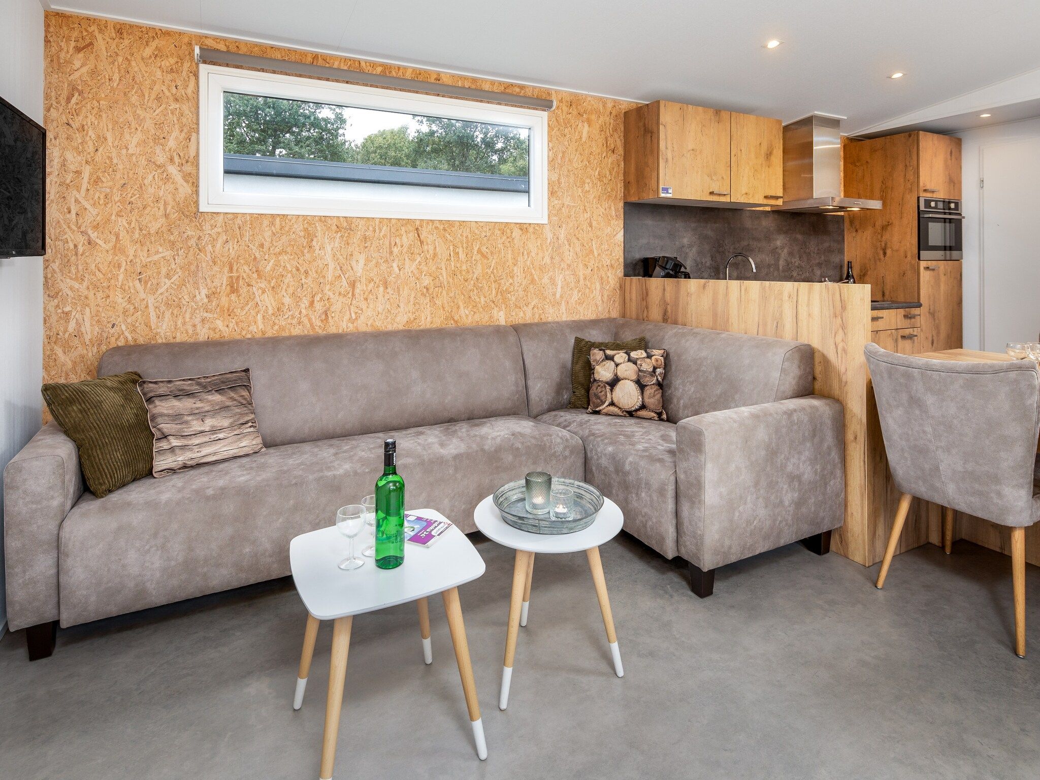 De woonkamer van Vakantiepark Hunzedal 12 in Borger