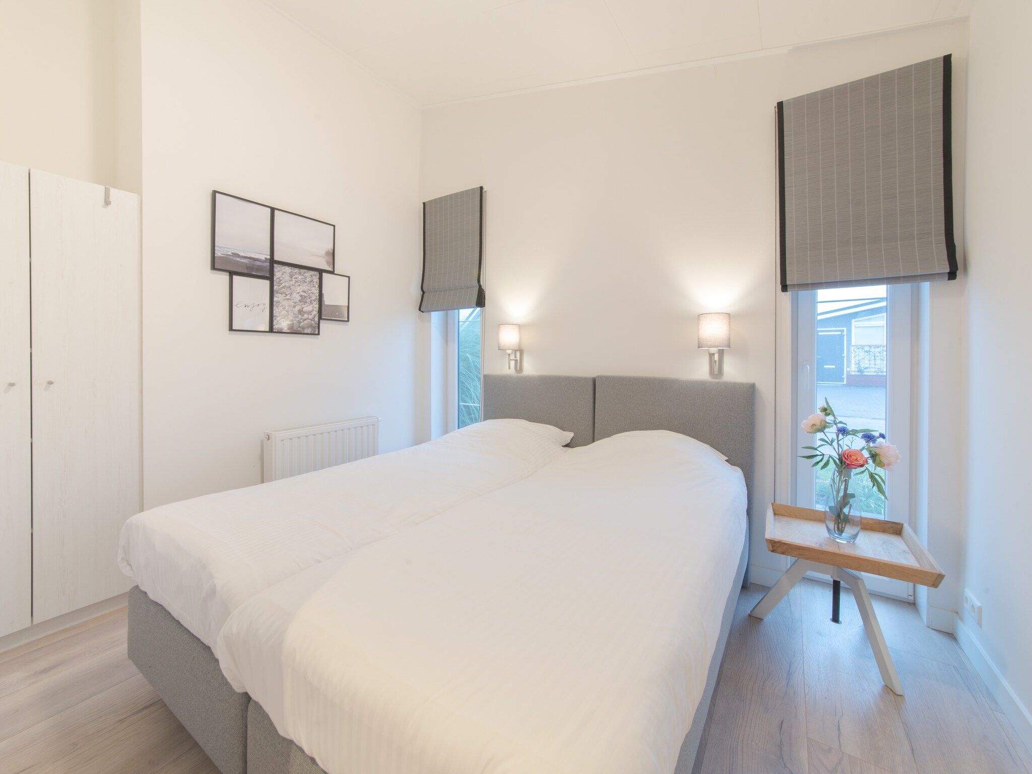 Een slaapkamer van Water Resort Oosterschelde 13 in Wemeldinge