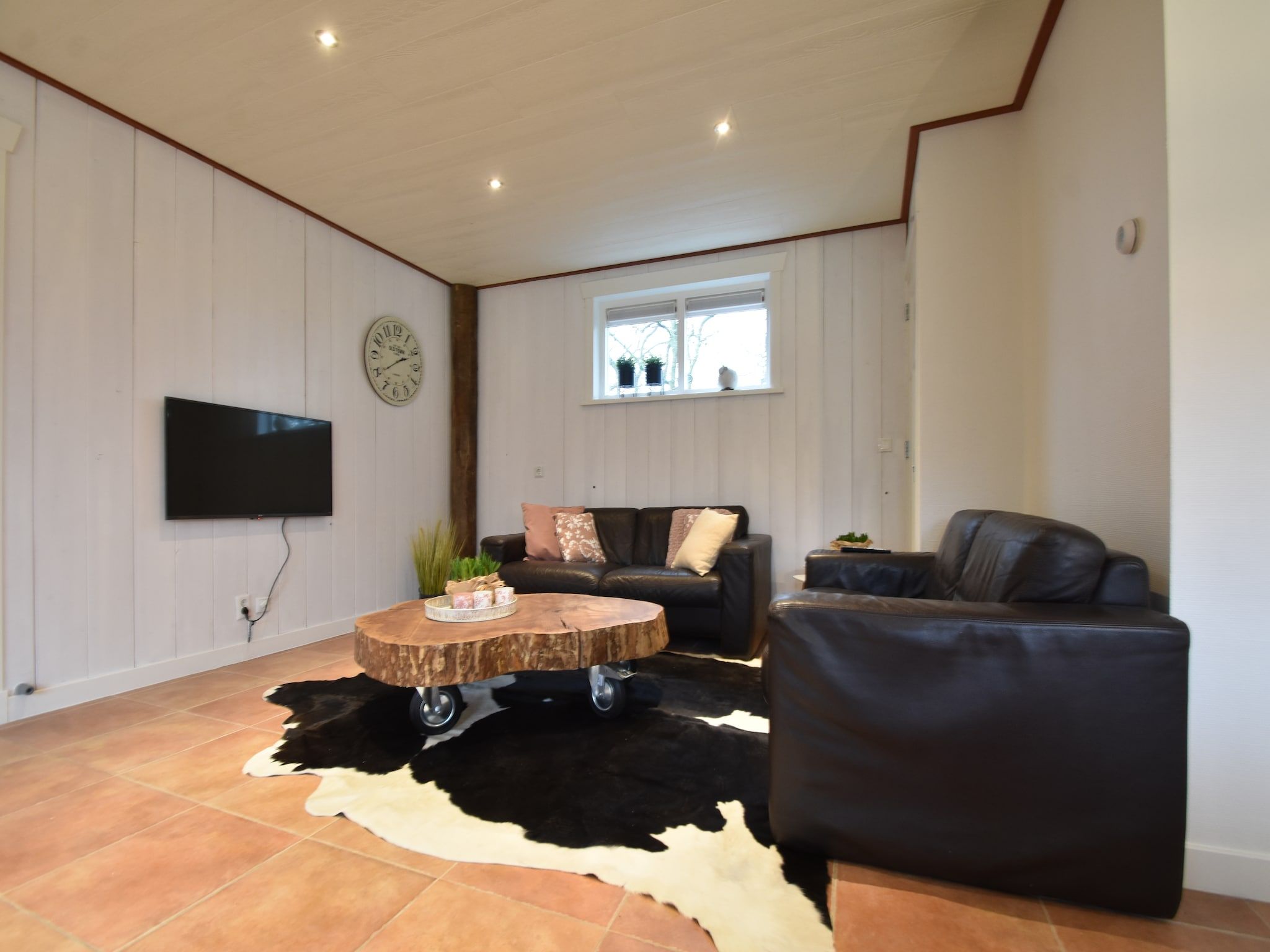 De woonkamer van 8p Garnekuul 1 in Callantsoog