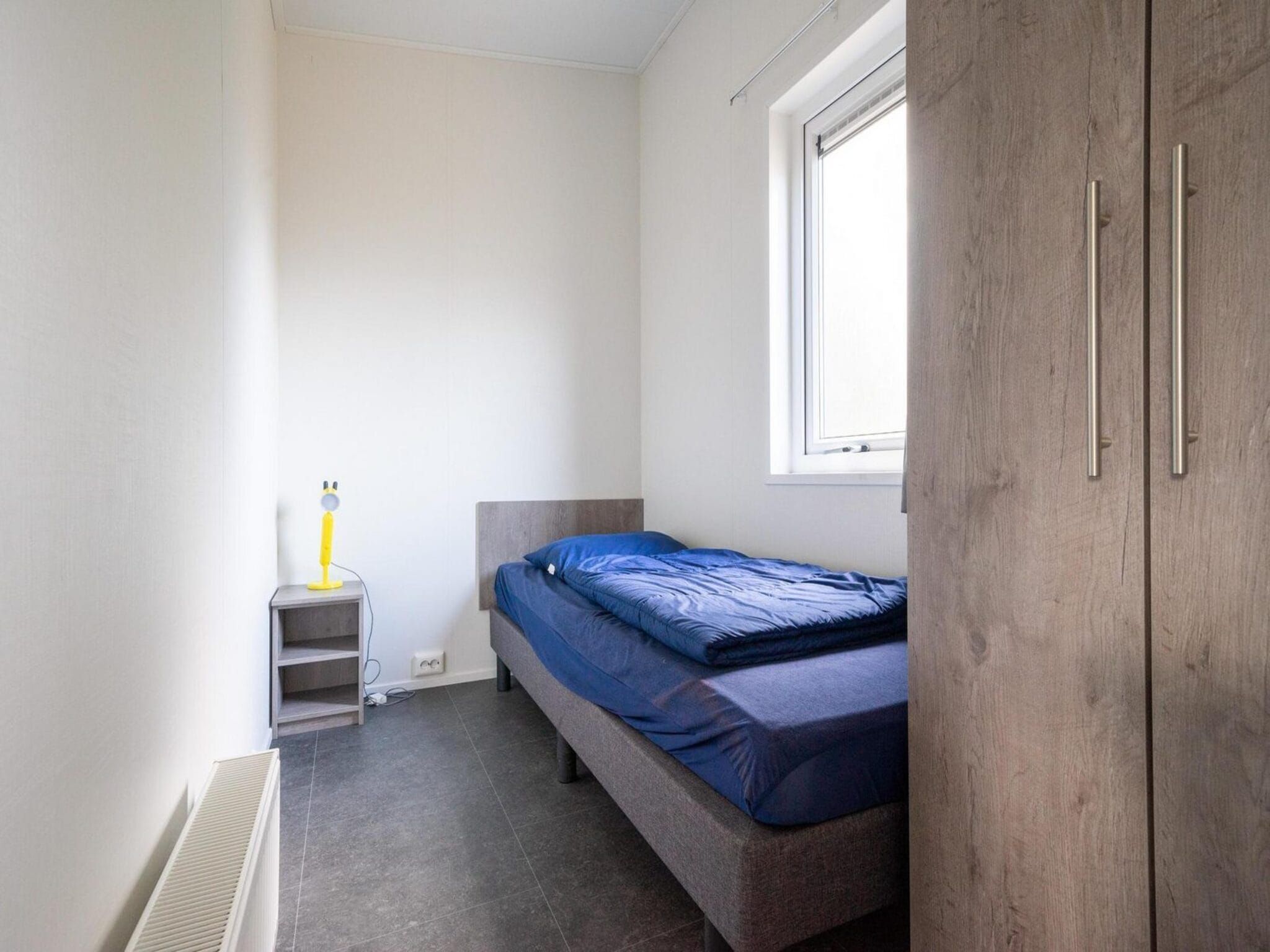 Een slaapkamer van Pavilion 5 in Otterlo
