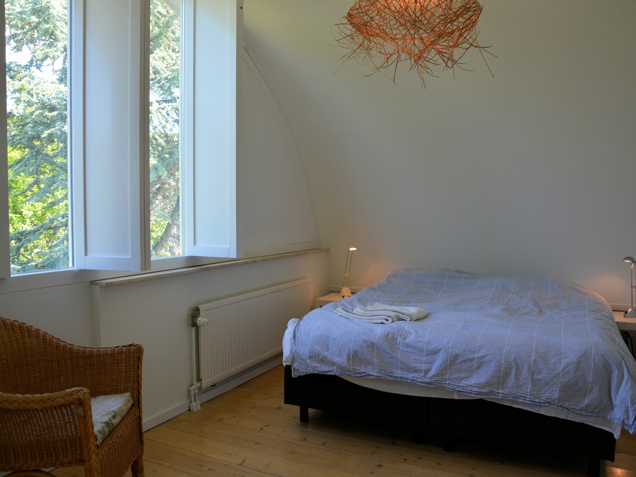 Een slaapkamer van Walhalla aan Zee in Noordwijk