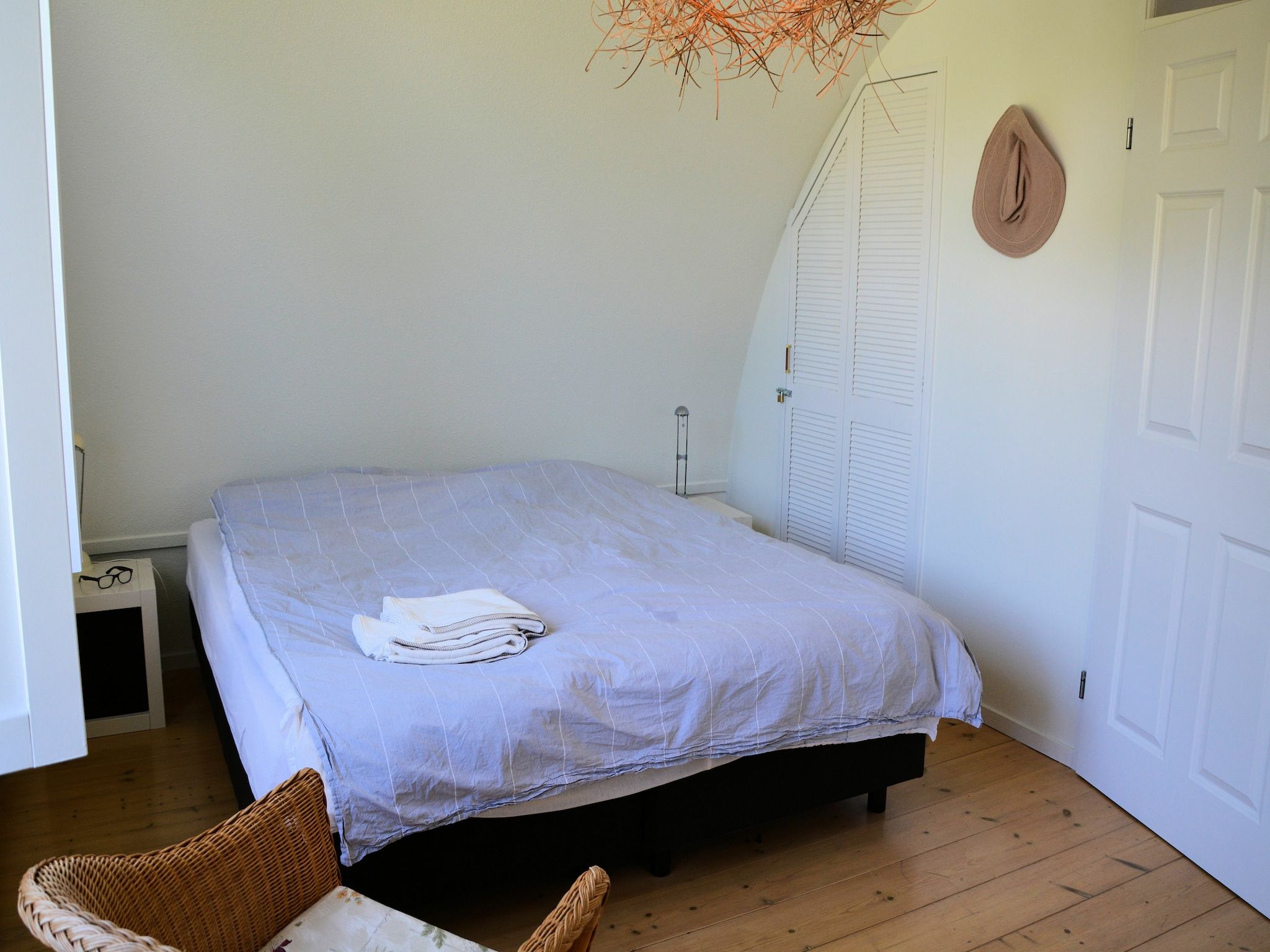 Een slaapkamer van Walhalla aan Zee in Noordwijk