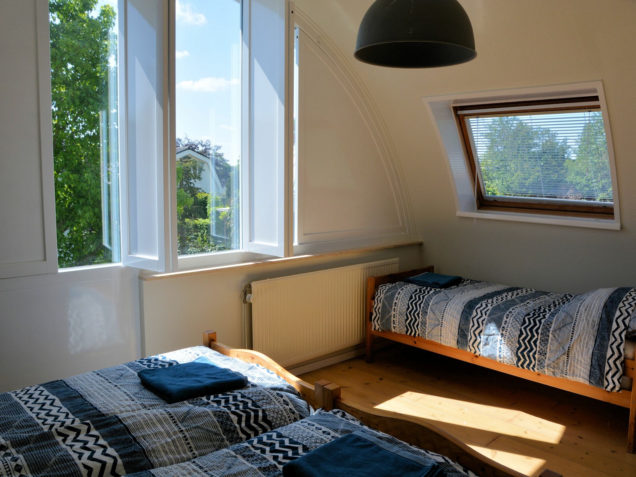 Een slaapkamer van Walhalla aan Zee in Noordwijk