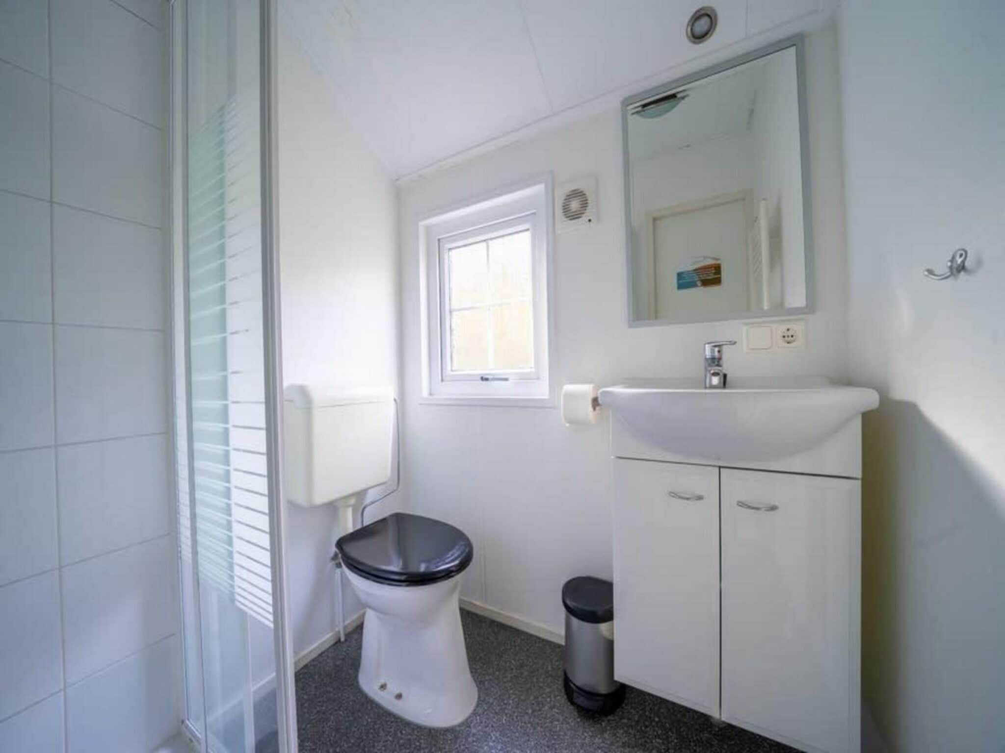 De badkamer van Boslodge 4 in Otterlo