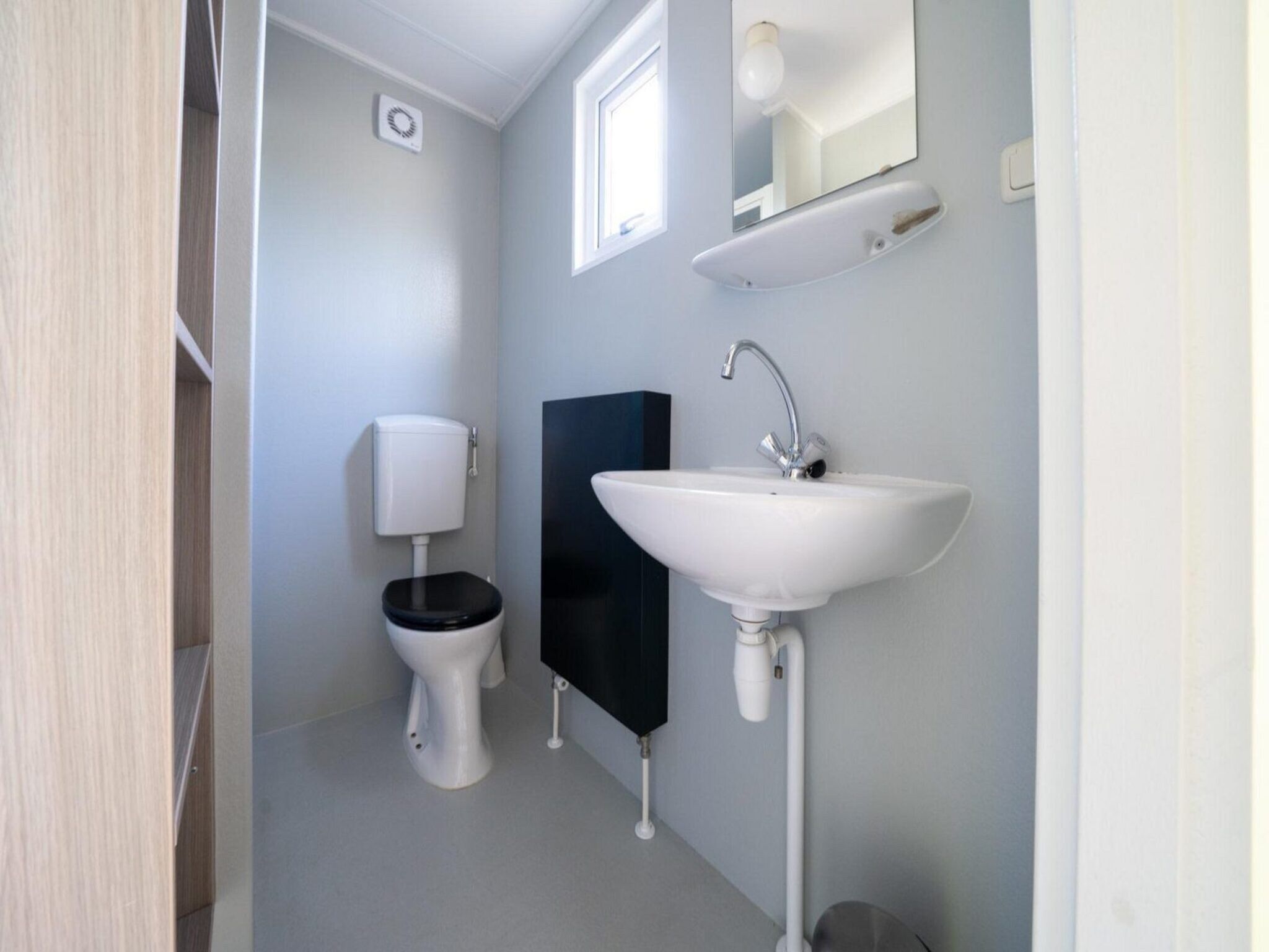 De badkamer van Mobilehome 4 in Otterlo
