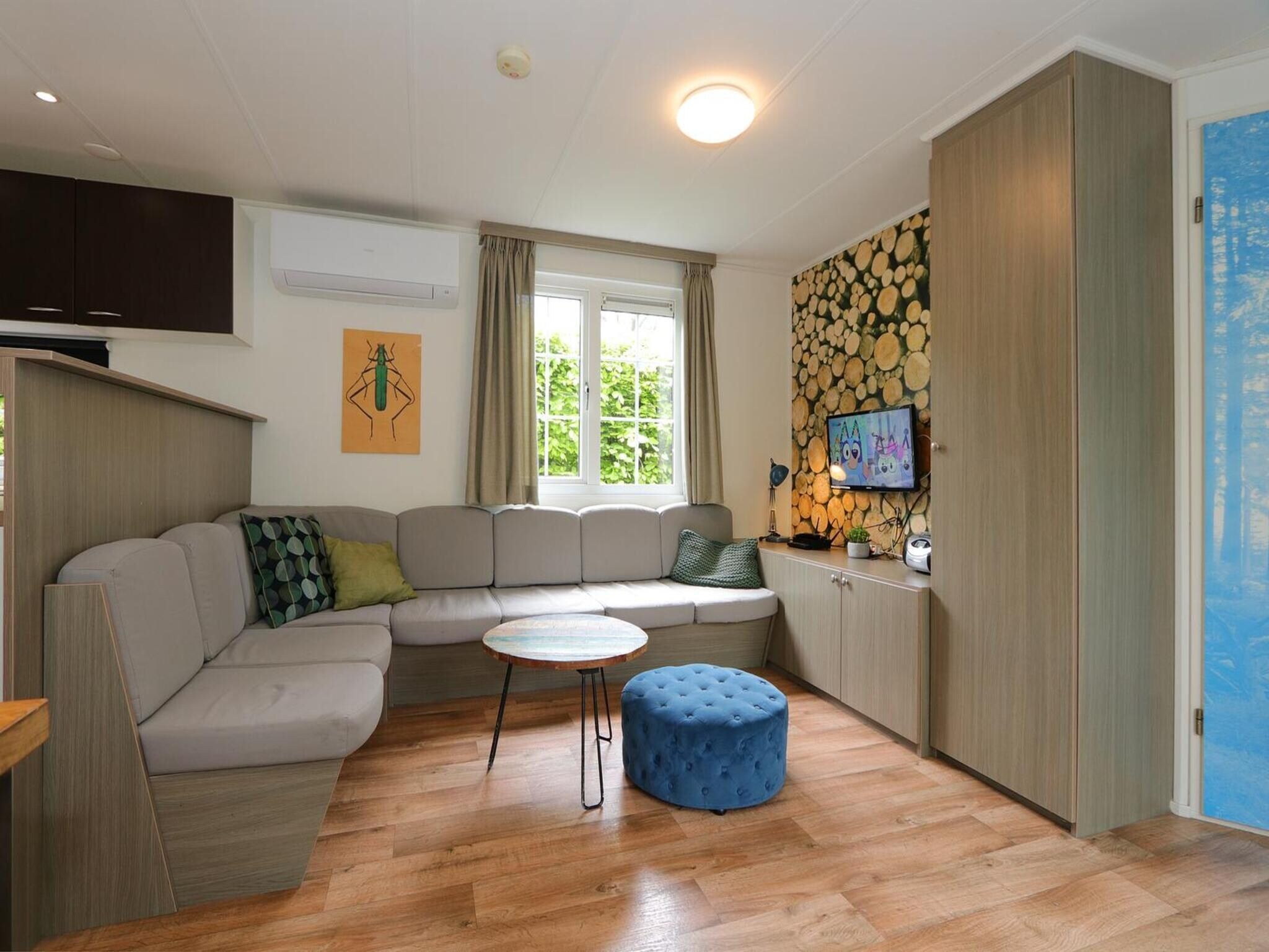 De woonkamer van Mobilehome 6 in Otterlo