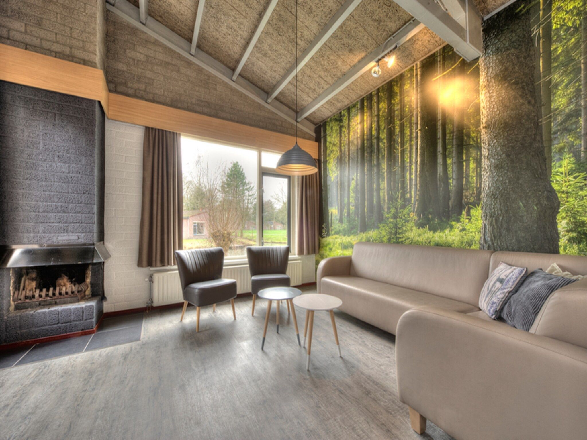 De woonkamer van Vakantiepark Weerterbergen 8 in Weert