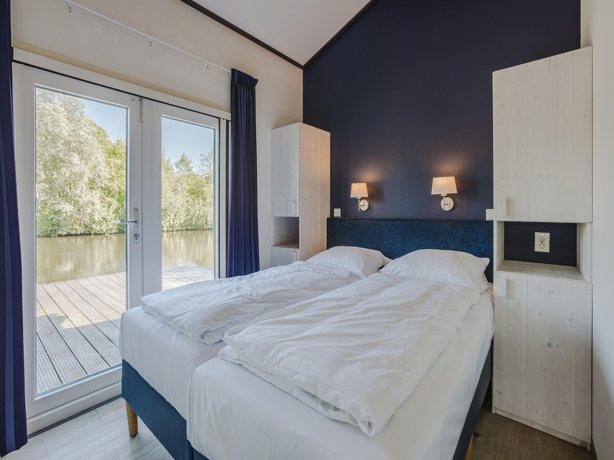 Een slaapkamer van Waterpark Terkaple 1 in Terkaple