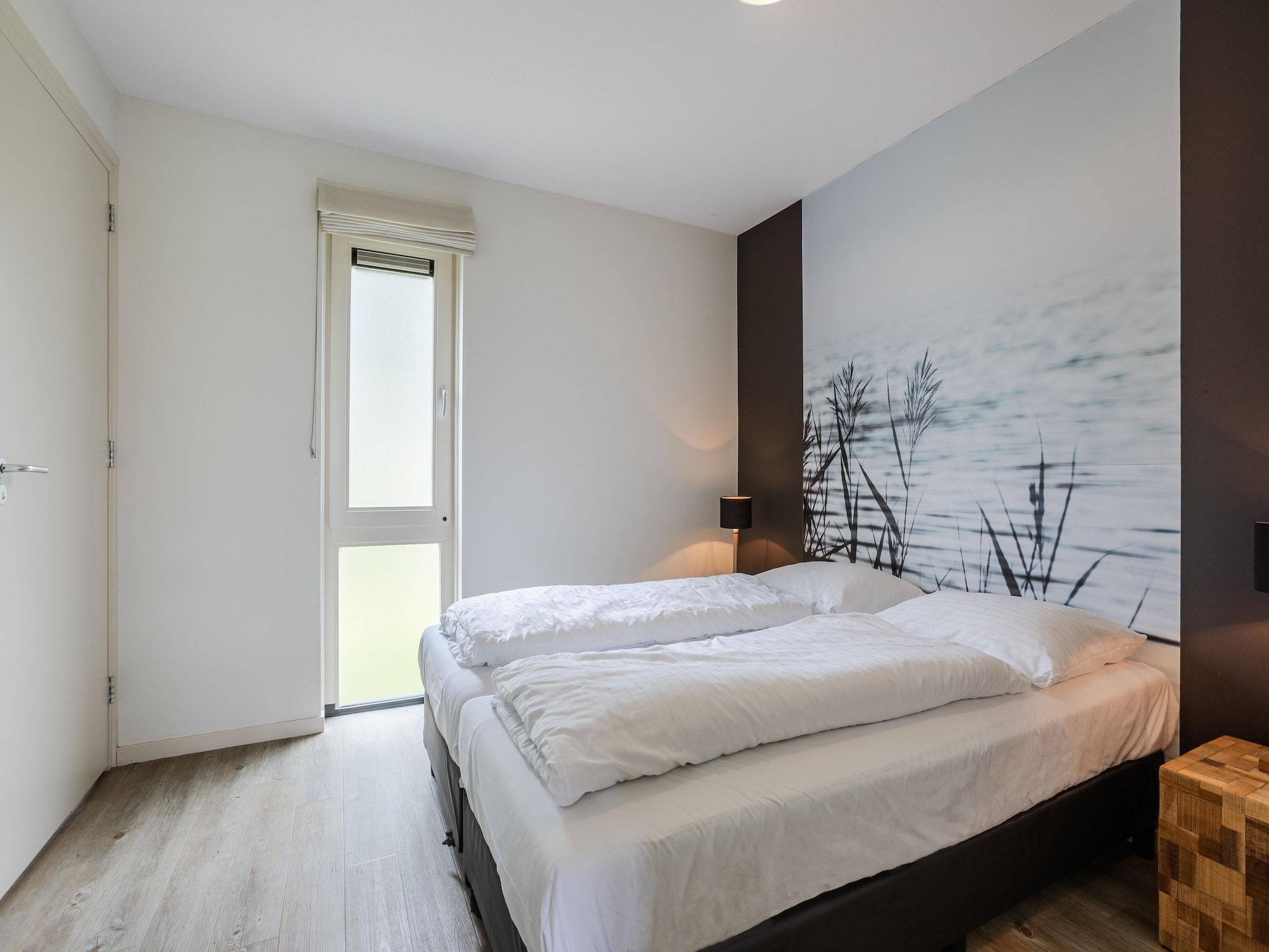 Een slaapkamer van Waterpark Terkaple 3 in Terkaple