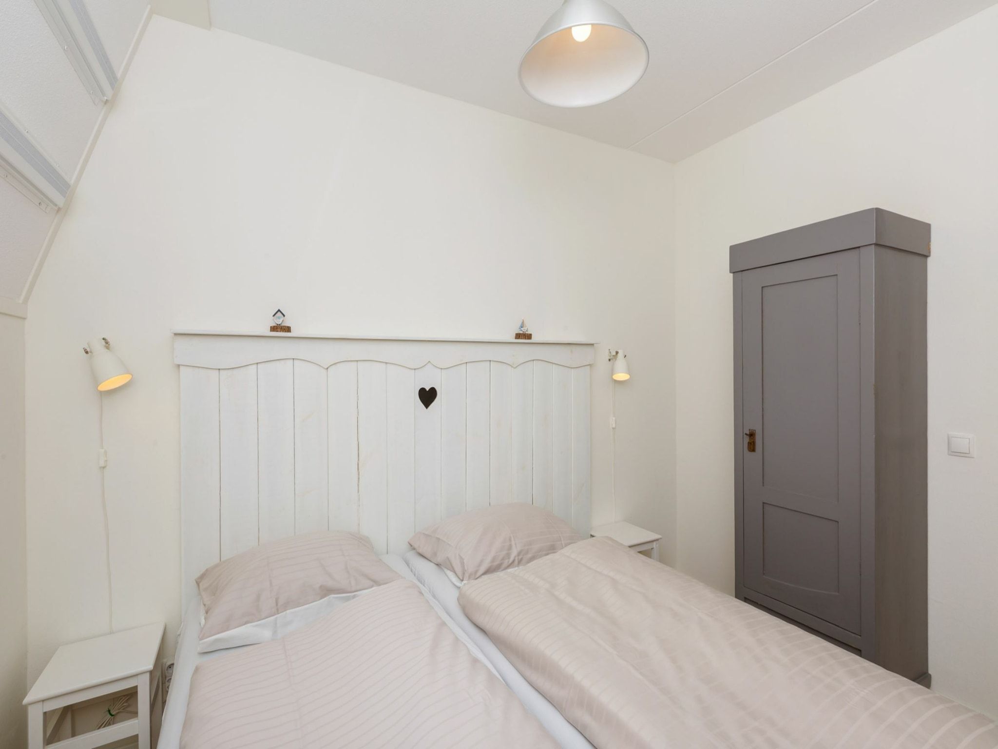Een slaapkamer van Appartement Duinhof Dishoek 13K - 6 personen de luxe in Koudekerke