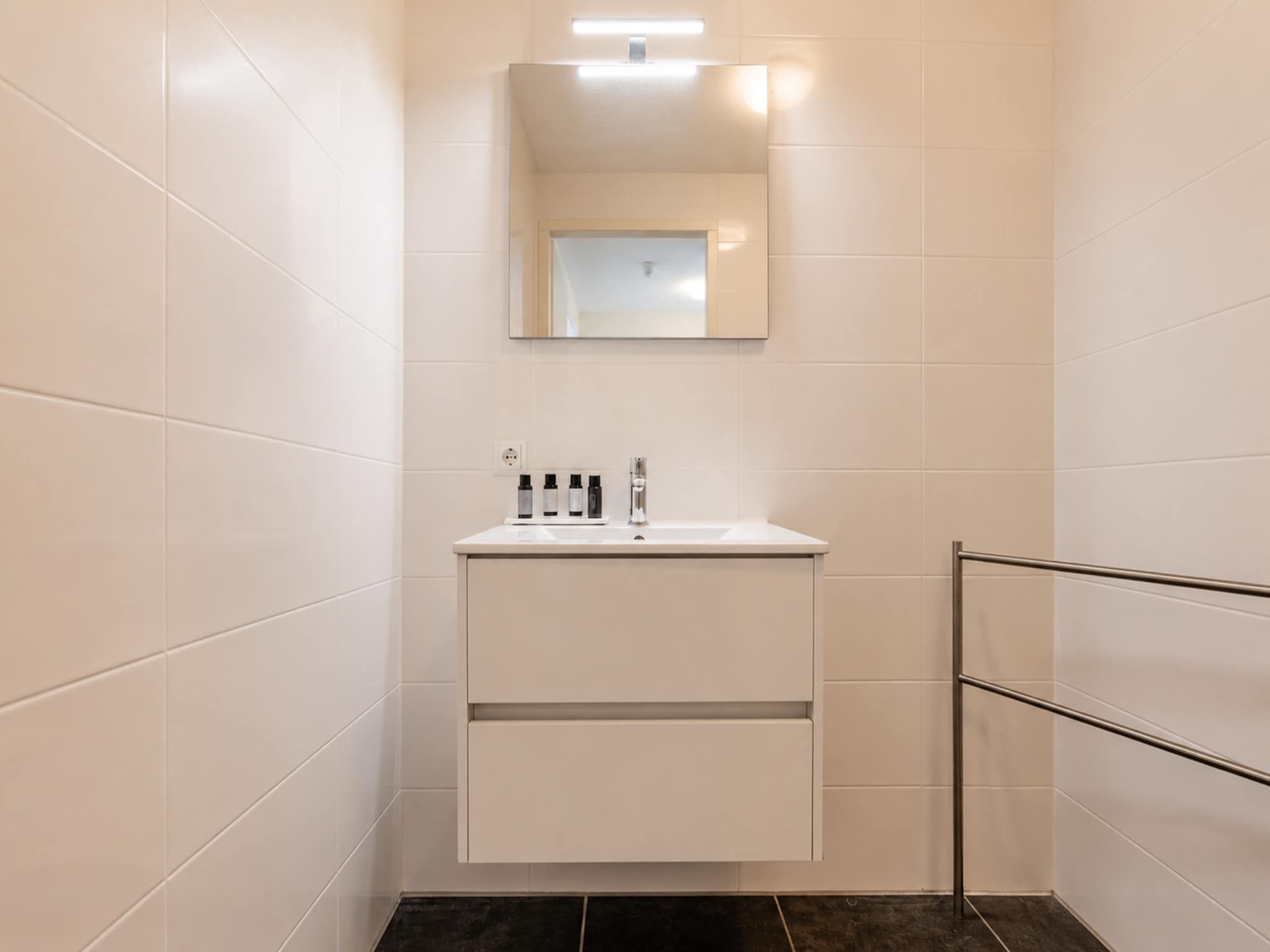 De badkamer van Appartement Duinhof Dishoek 13H - 6 pers de luxe in Koudekerke