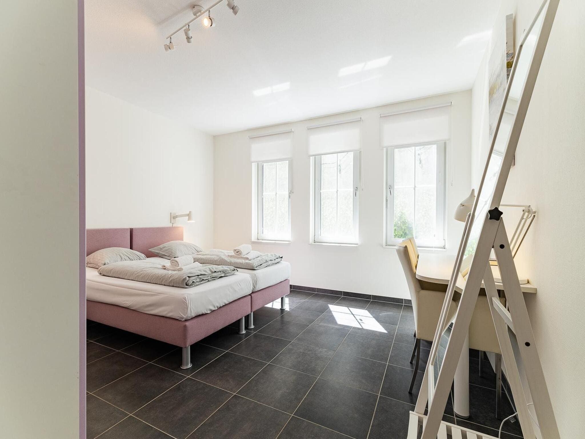 Een slaapkamer van Appartement Duinhof Dishoek 13H - 6 pers de luxe in Koudekerke