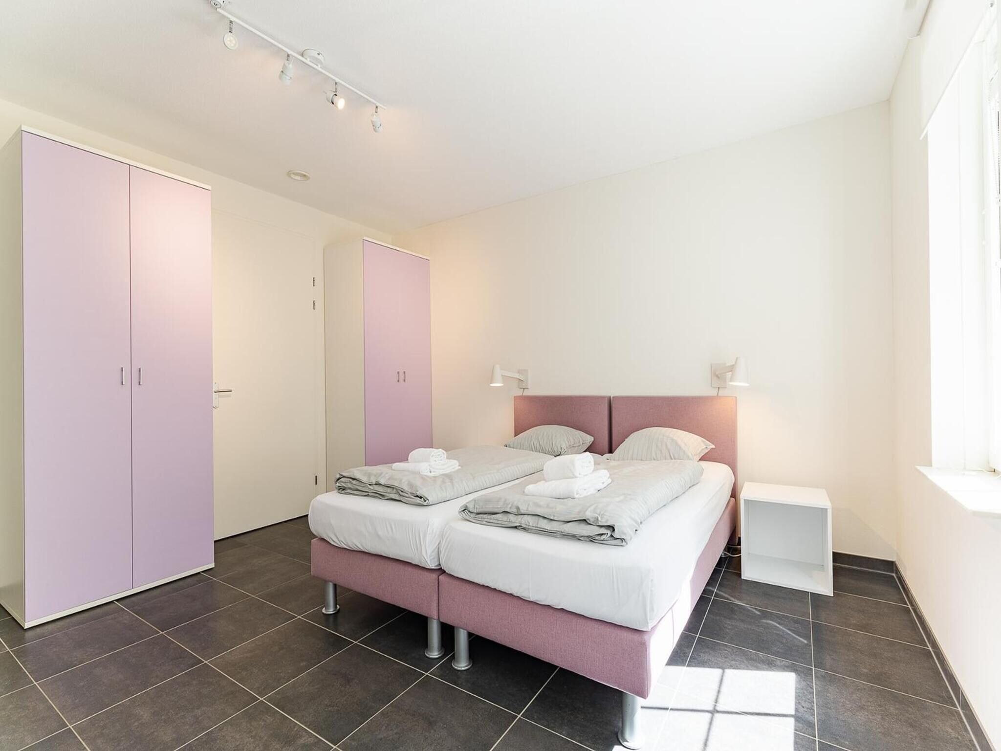 Een slaapkamer van Appartement Duinhof Dishoek 13H - 6 pers de luxe in Koudekerke