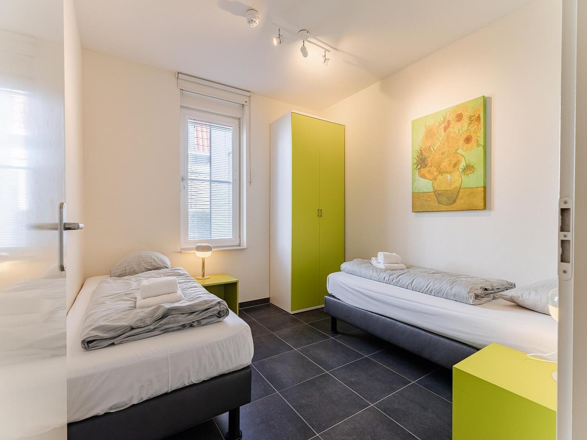 Een slaapkamer van Appartement Duinhof Dishoek 13H - 6 pers de luxe in Koudekerke