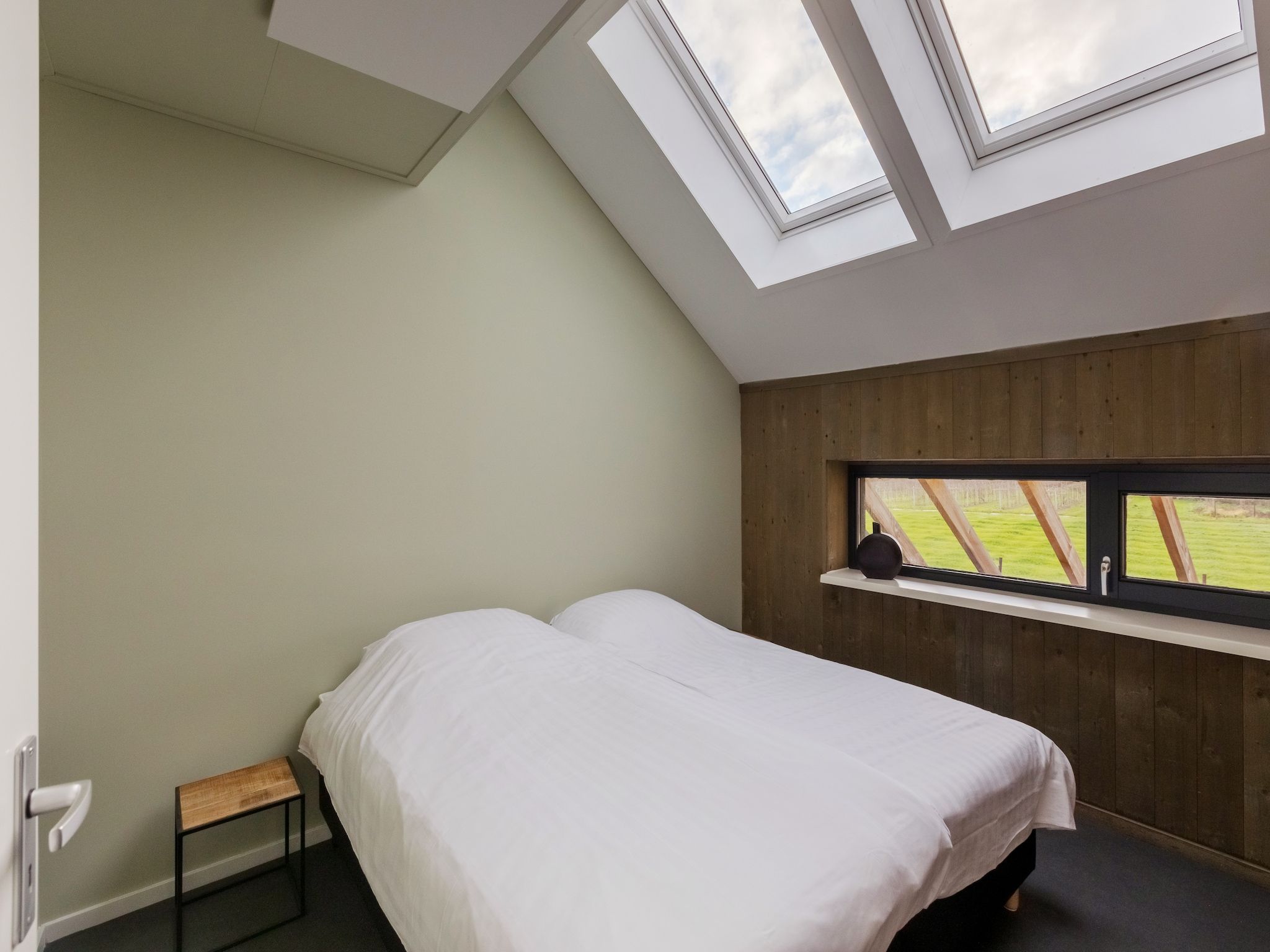 Een slaapkamer van Vroondijk 2-Zeebloesem in Vrouwenpolder