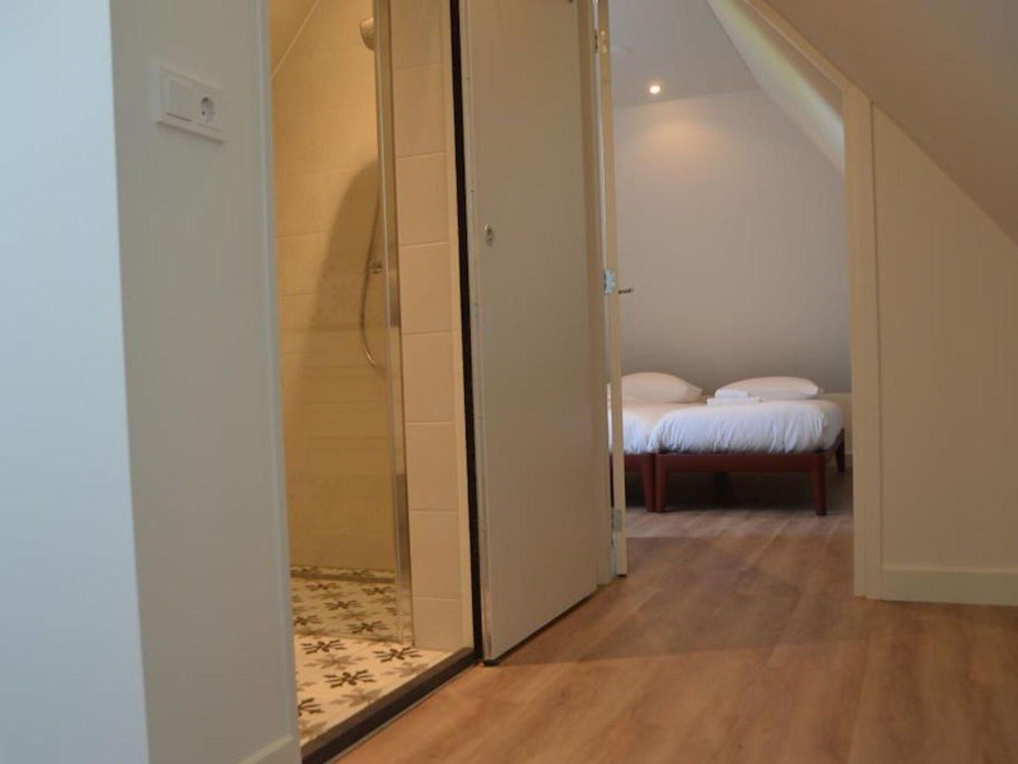 Een slaapkamer van Het Wambuis in Den Hoorn- Texel