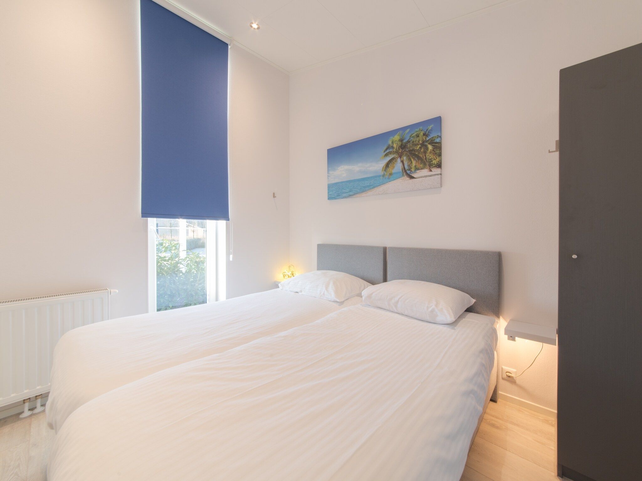 Een slaapkamer van Water Resort Oosterschelde 103 in Wemeldinge