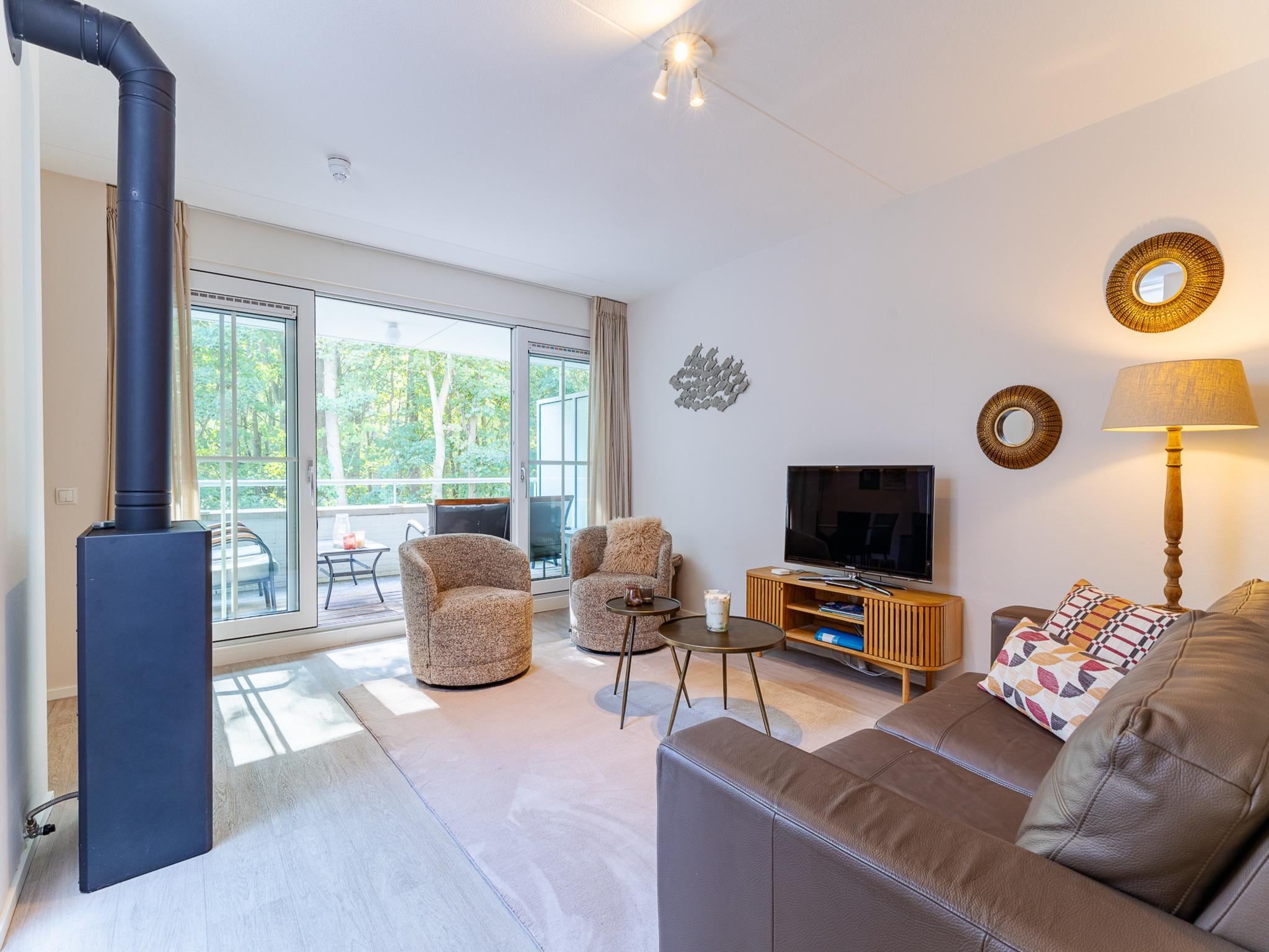 De woonkamer van Appartement Duinhof Dishoek 13M - 6 personen de luxe in Koudekerke