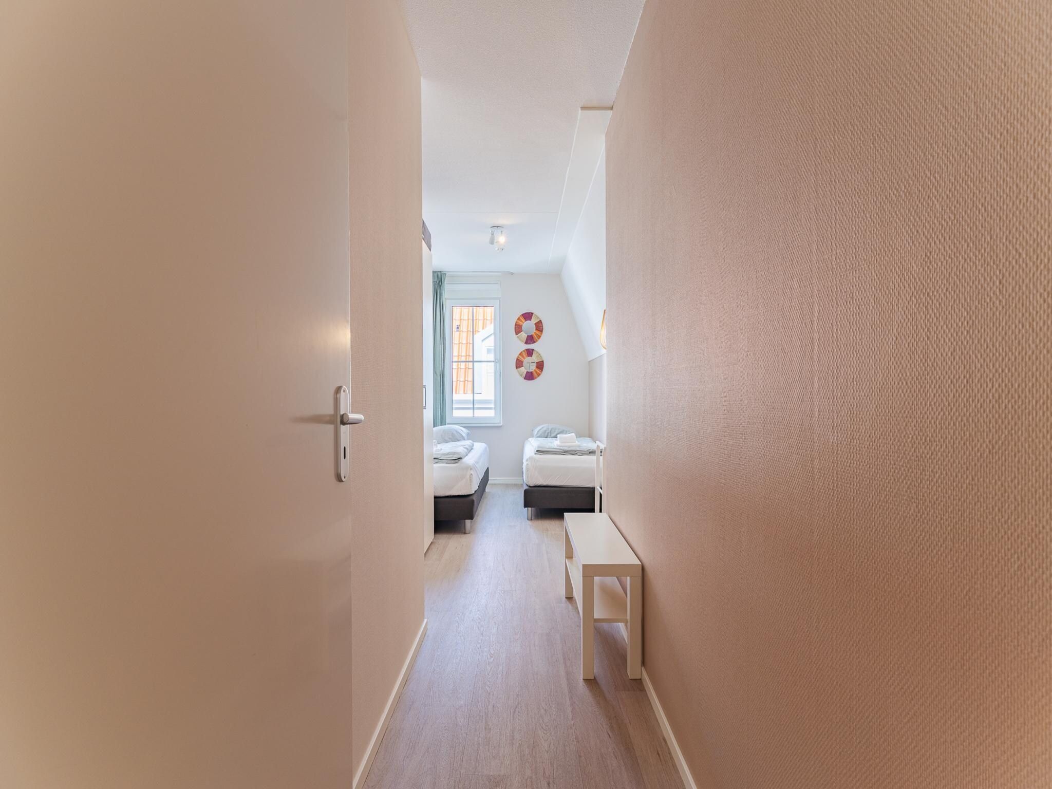 Een slaapkamer van Appartement Duinhof Dishoek 13M - 6 personen de luxe in Koudekerke