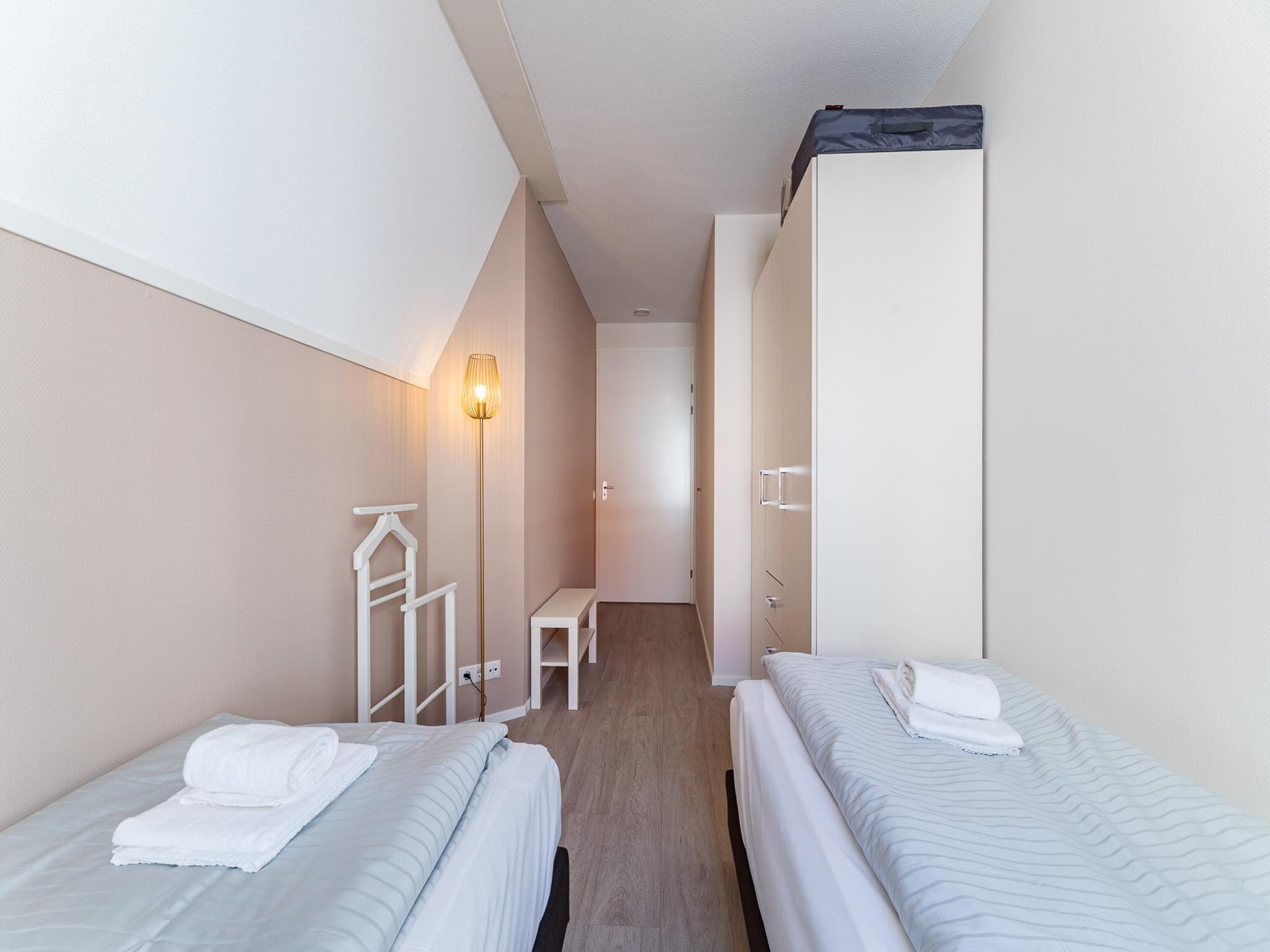 Een slaapkamer van Appartement Duinhof Dishoek 13M - 6 personen de luxe in Koudekerke
